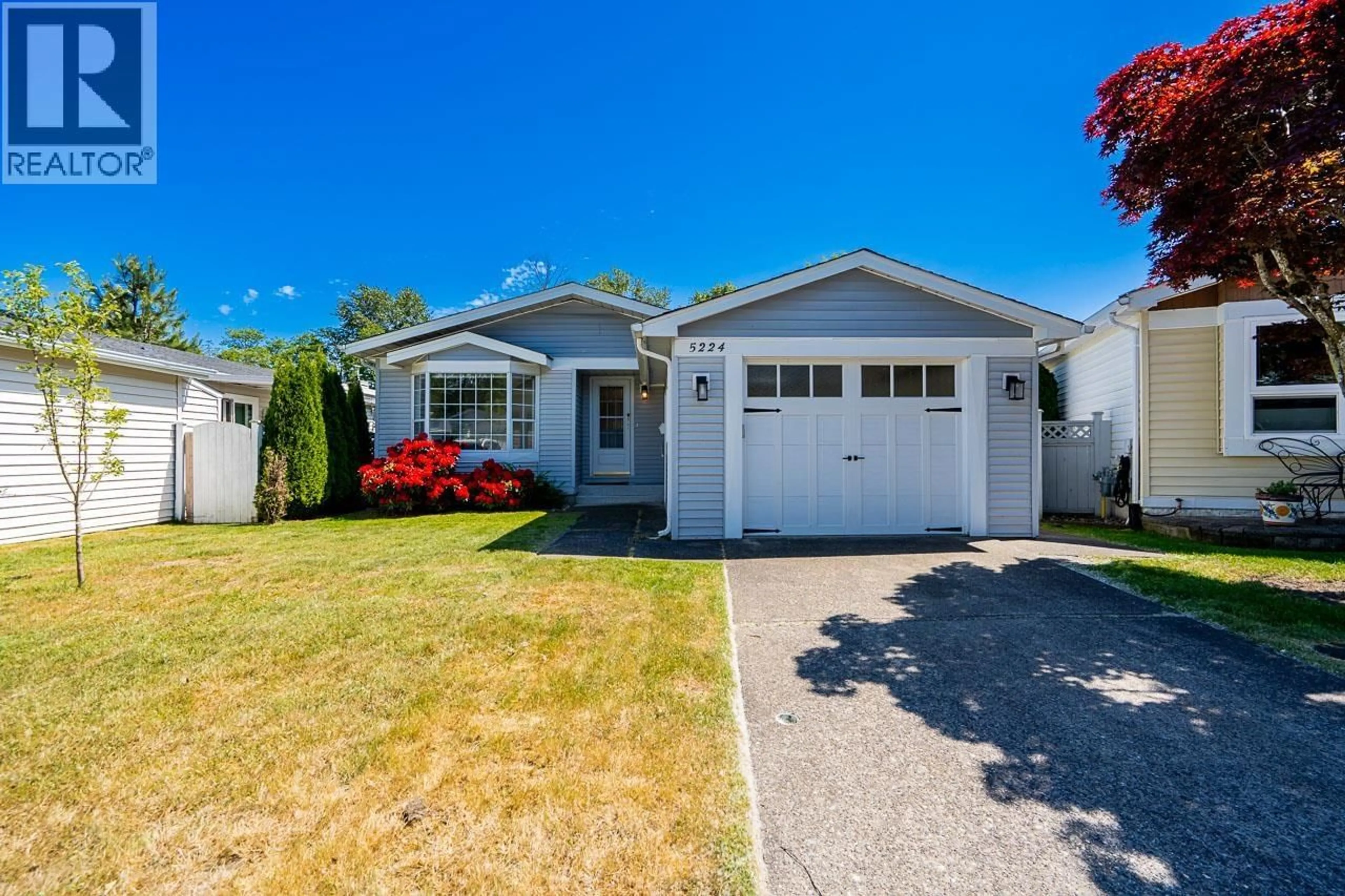 Home with vinyl exterior material, street for 5224 REGATTA WAY, Delta British Columbia V4K4N5