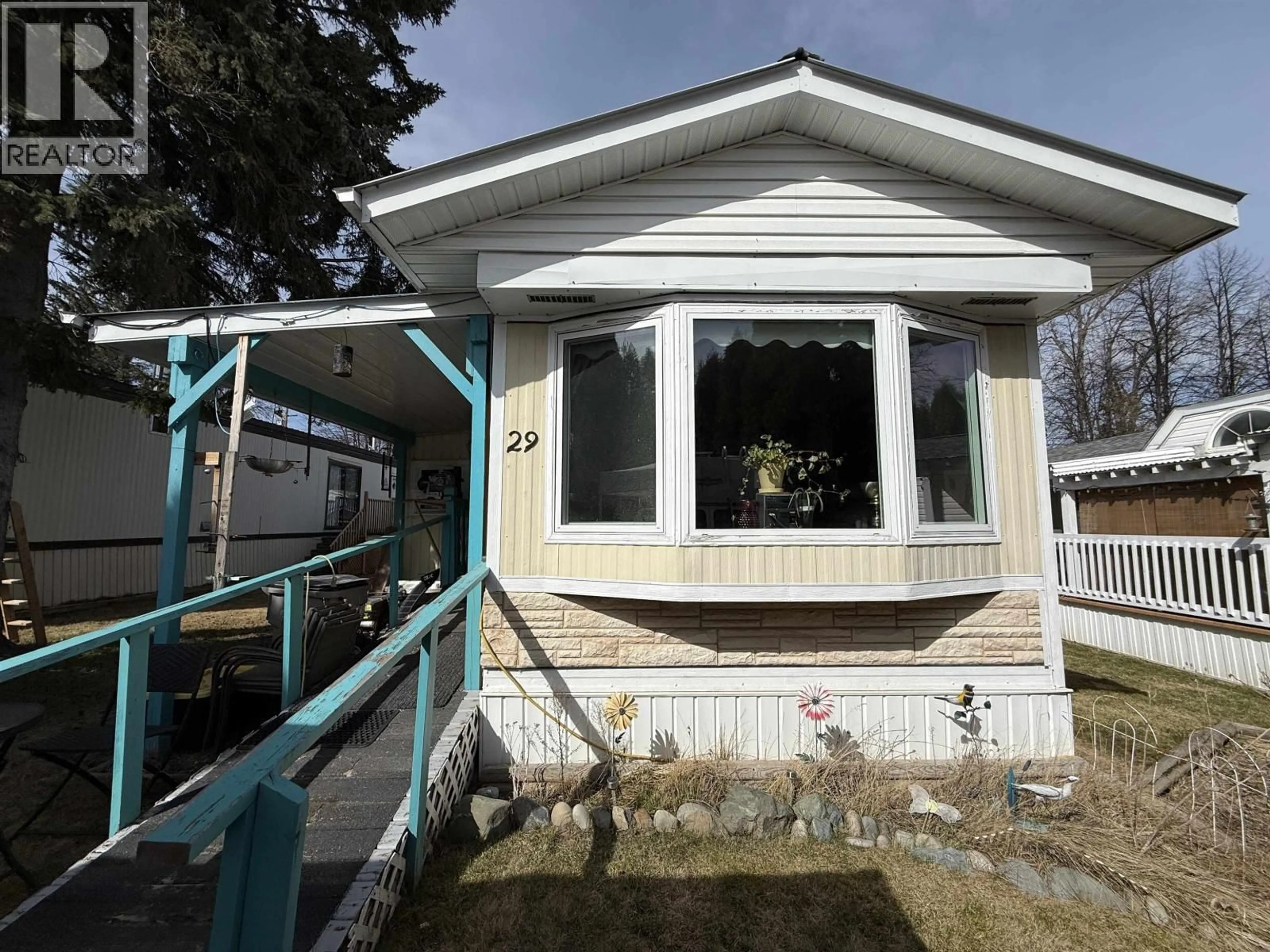 Home with vinyl exterior material, street for 29 - 654 NORTH FRASER DRIVE, Quesnel British Columbia V2J1Z6