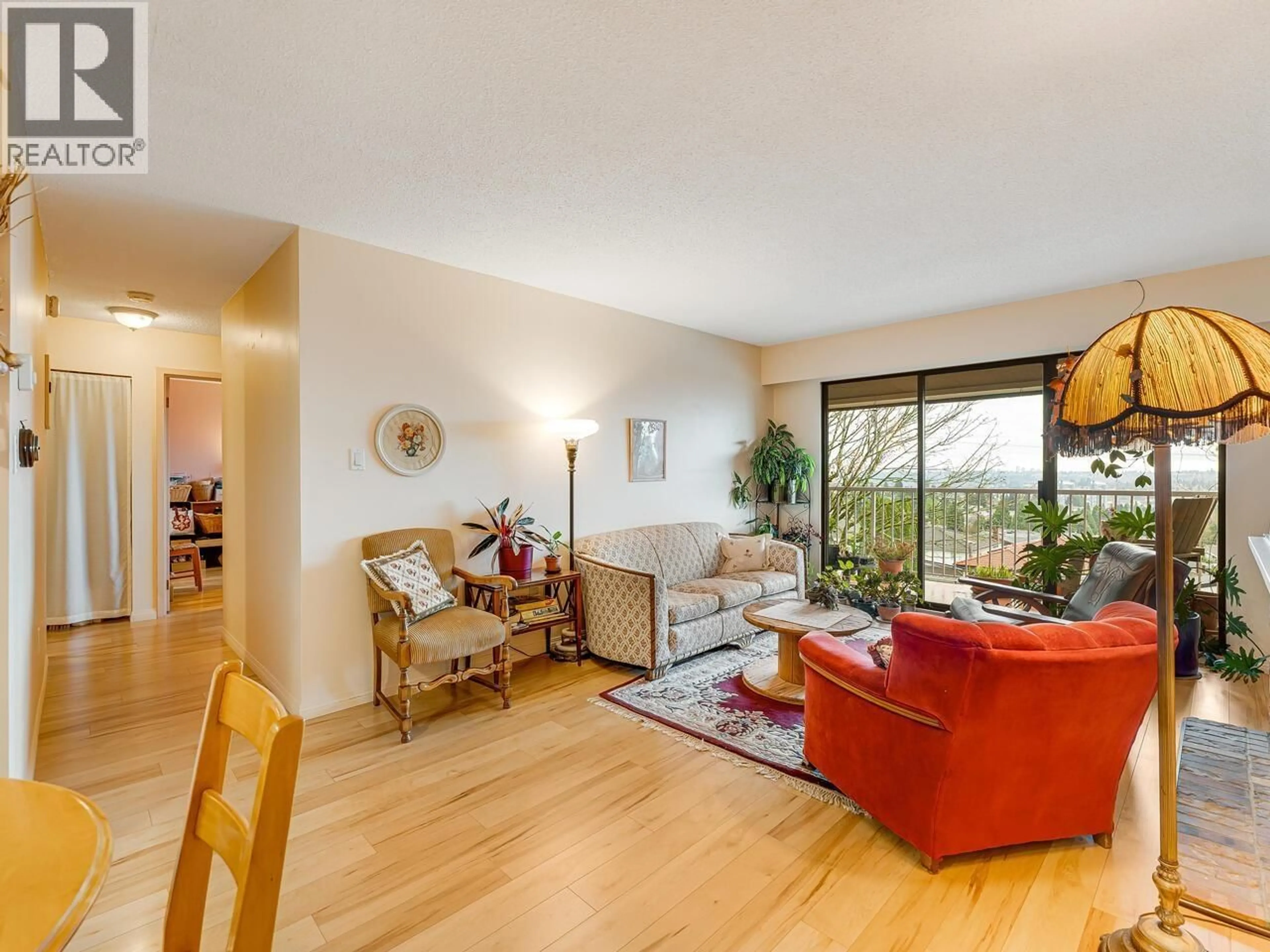 Living room with furniture, wood/laminate floor for 307 - 5340 HASTINGS STREET, Burnaby British Columbia V5B1R1