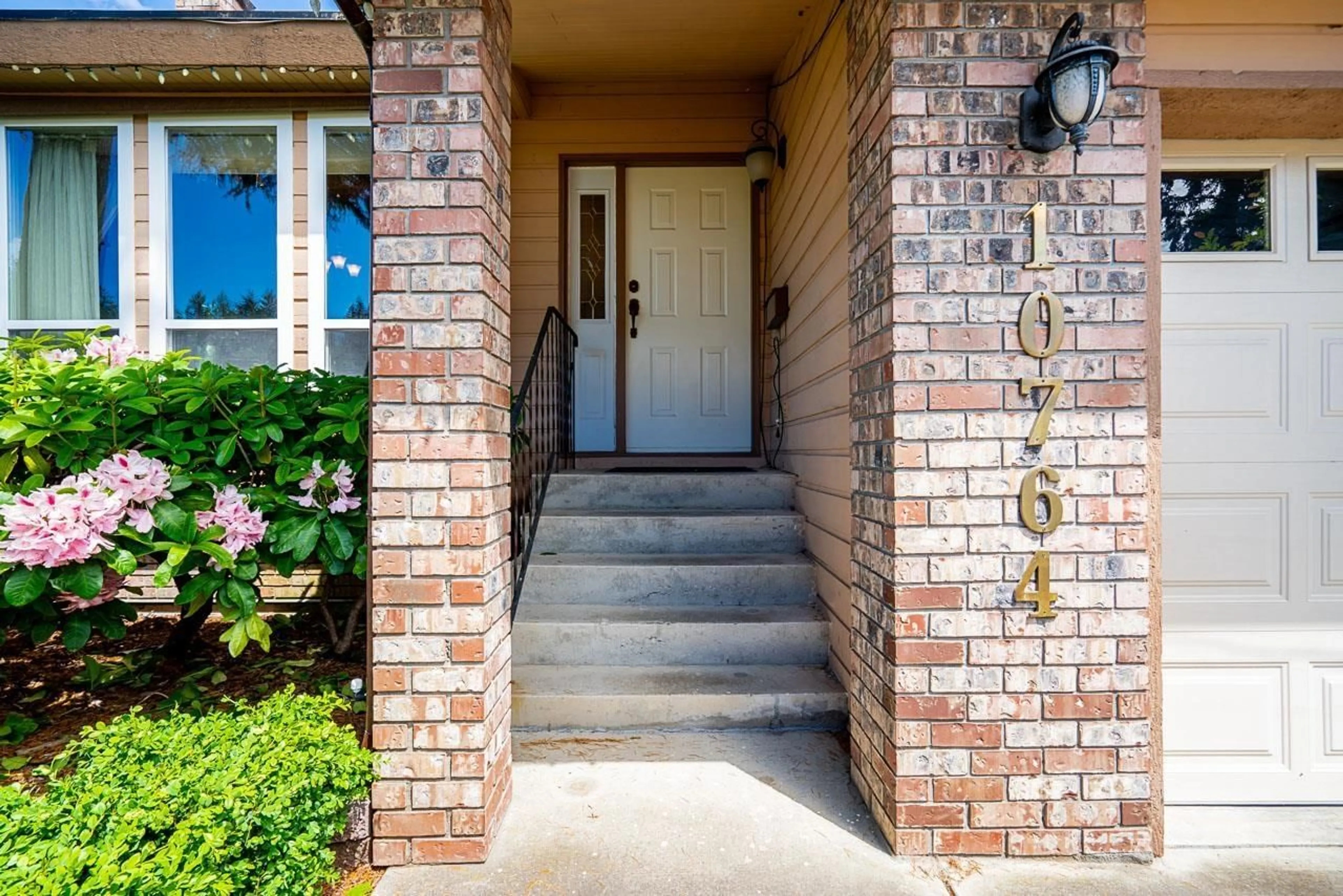 Home with brick exterior material, street for 10764 FRASERGLEN DRIVE, Surrey British Columbia V4N1Y3