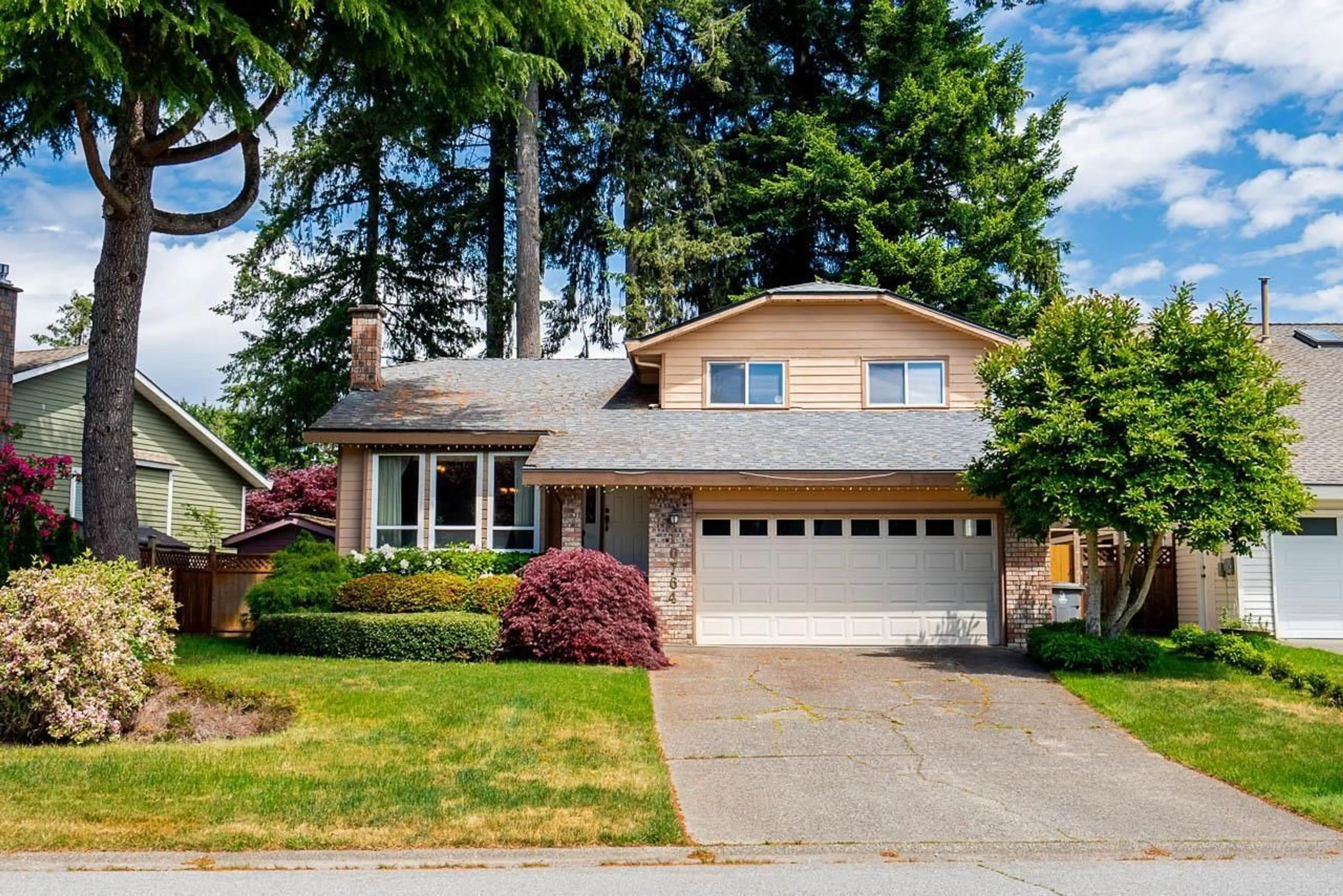 Home with vinyl exterior material, street for 10764 FRASERGLEN DRIVE, Surrey British Columbia V4N1Y3