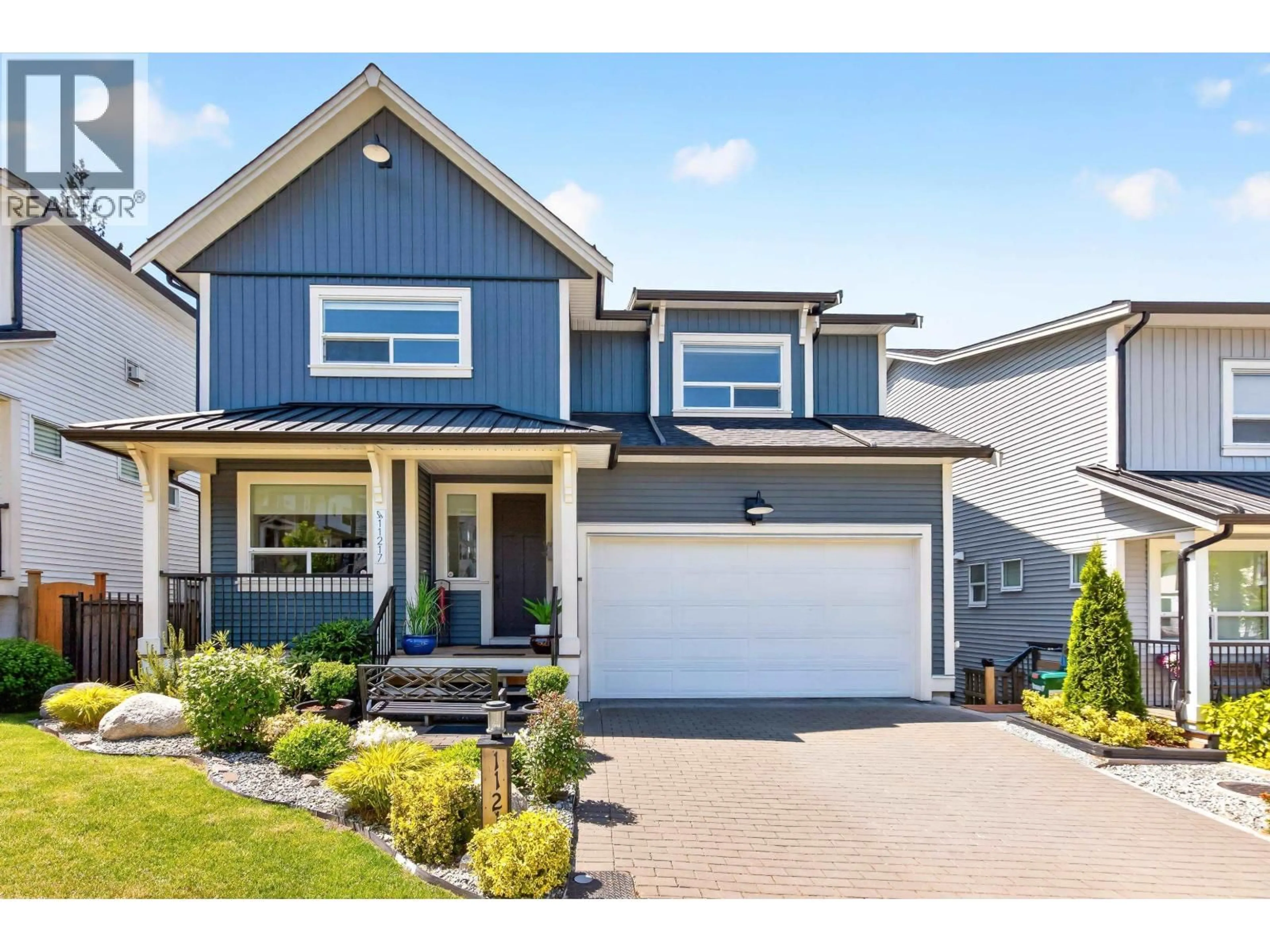 Home with vinyl exterior material, street for 11217 250B STREET, Maple Ridge British Columbia V2W0K6