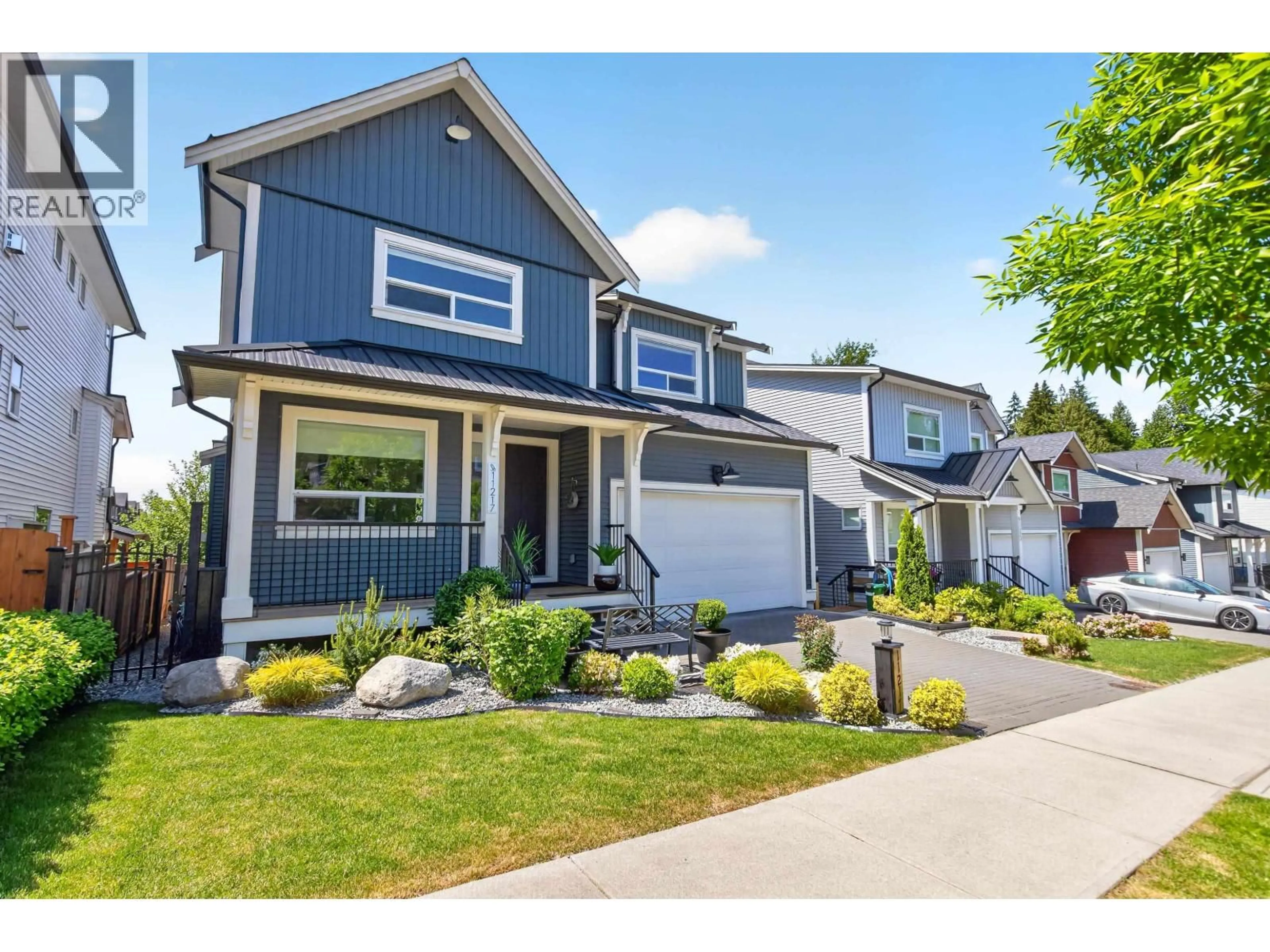 Home with vinyl exterior material, street for 11217 250B STREET, Maple Ridge British Columbia V2W0K6