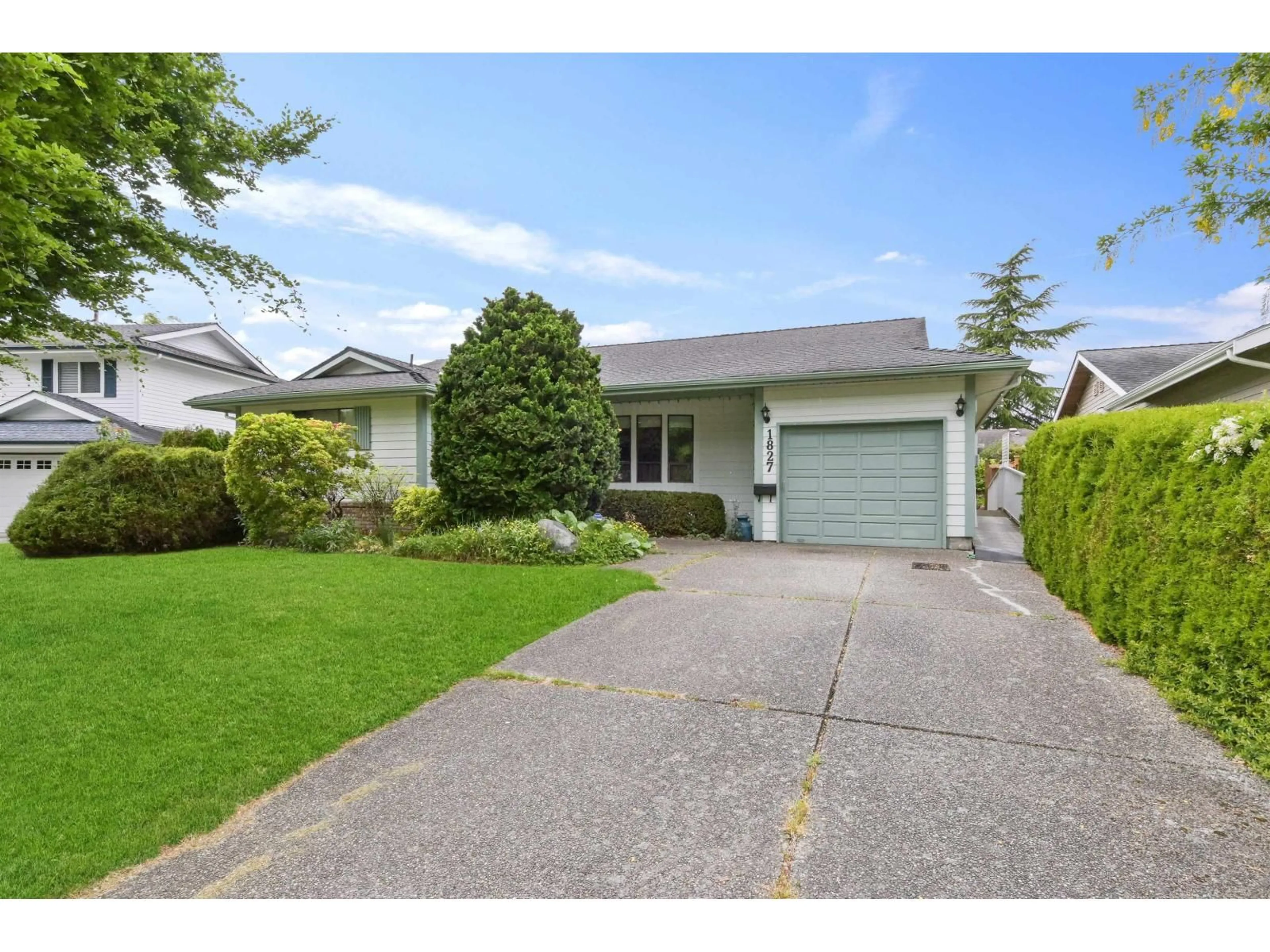 Home with vinyl exterior material, street for 1827 142ND STREET, Surrey British Columbia V4A6V3