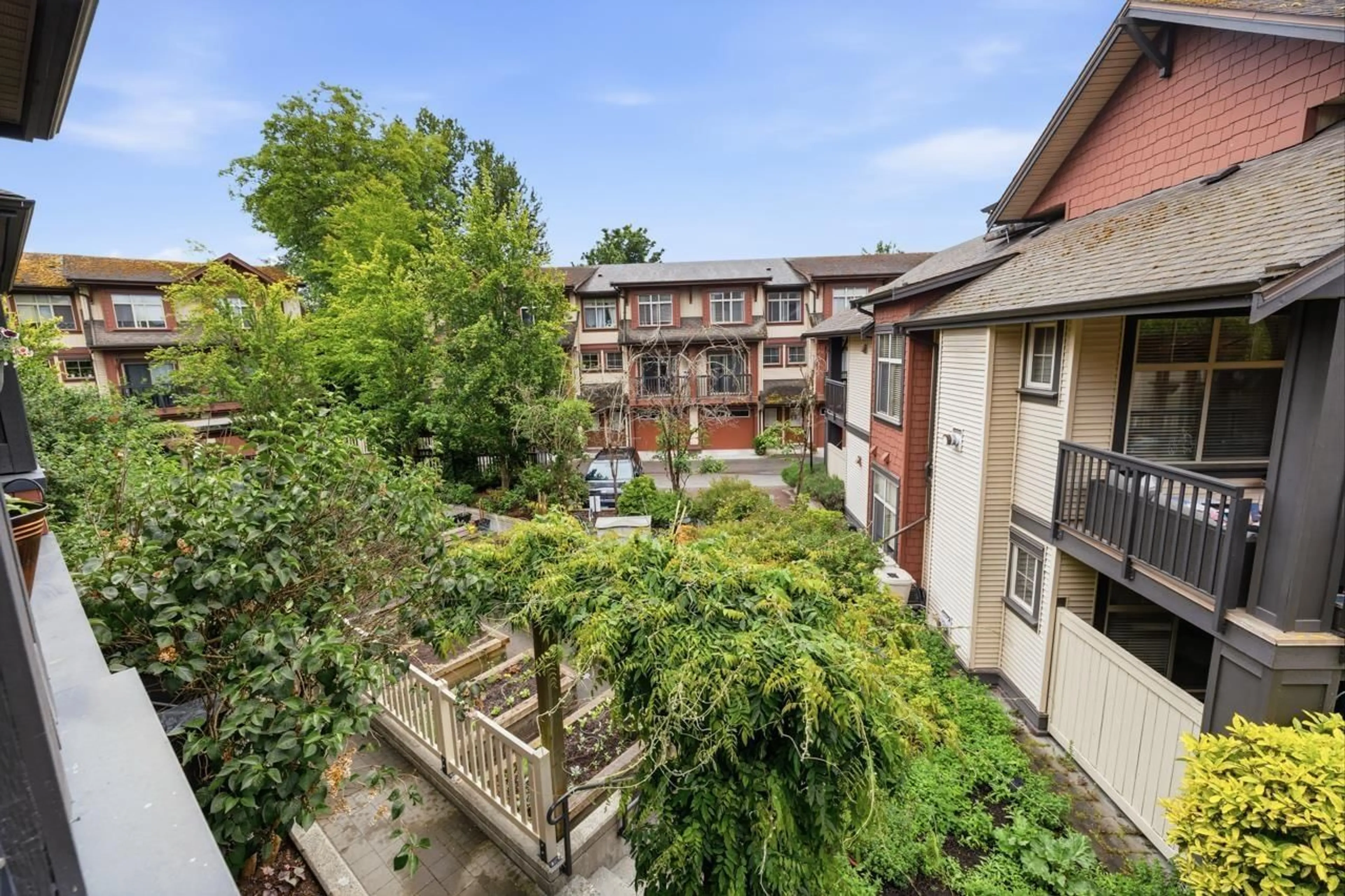 Patio, city buildings view from balcony for 56 - 19478 65 AVENUE, Surrey British Columbia V4N5X5