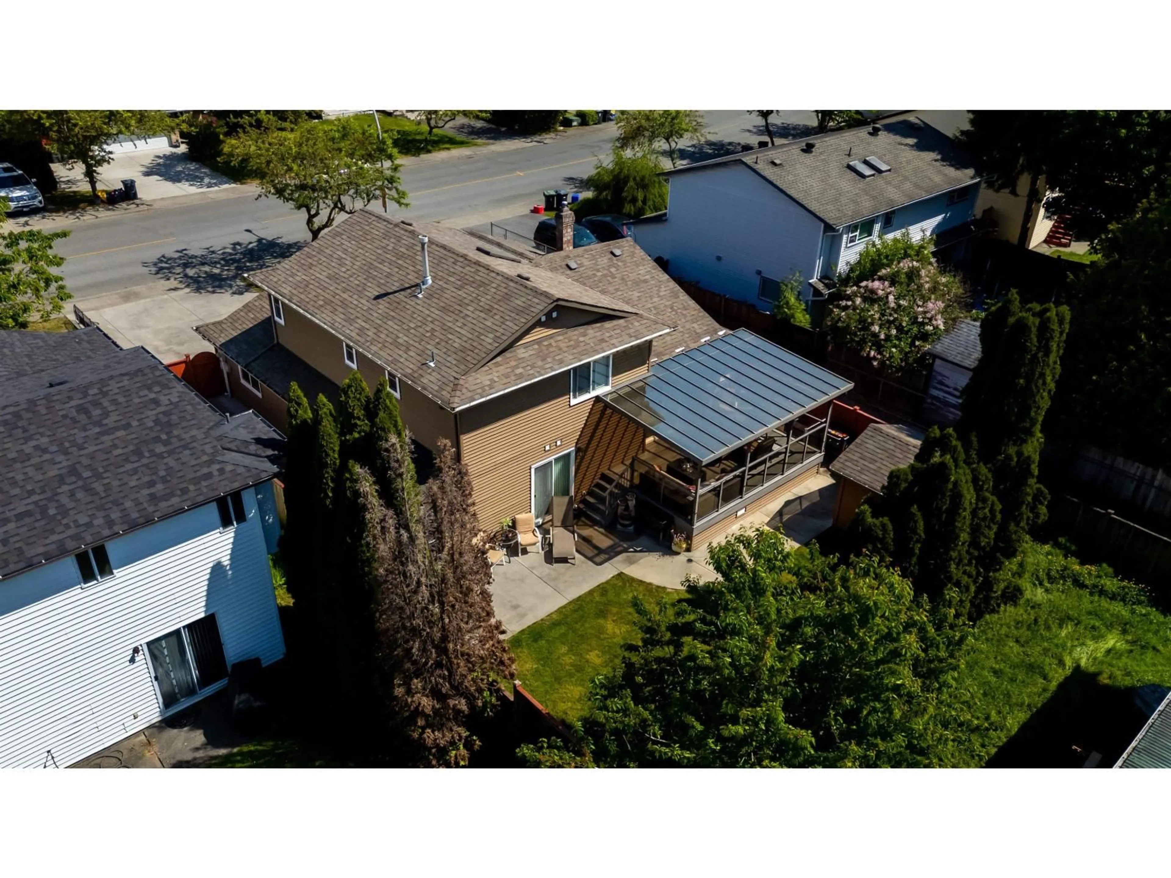 A pic from outside/outdoor area/front of a property/back of a property/a pic from drone, street for 21242 92 AVENUE, Langley British Columbia V1M1L2