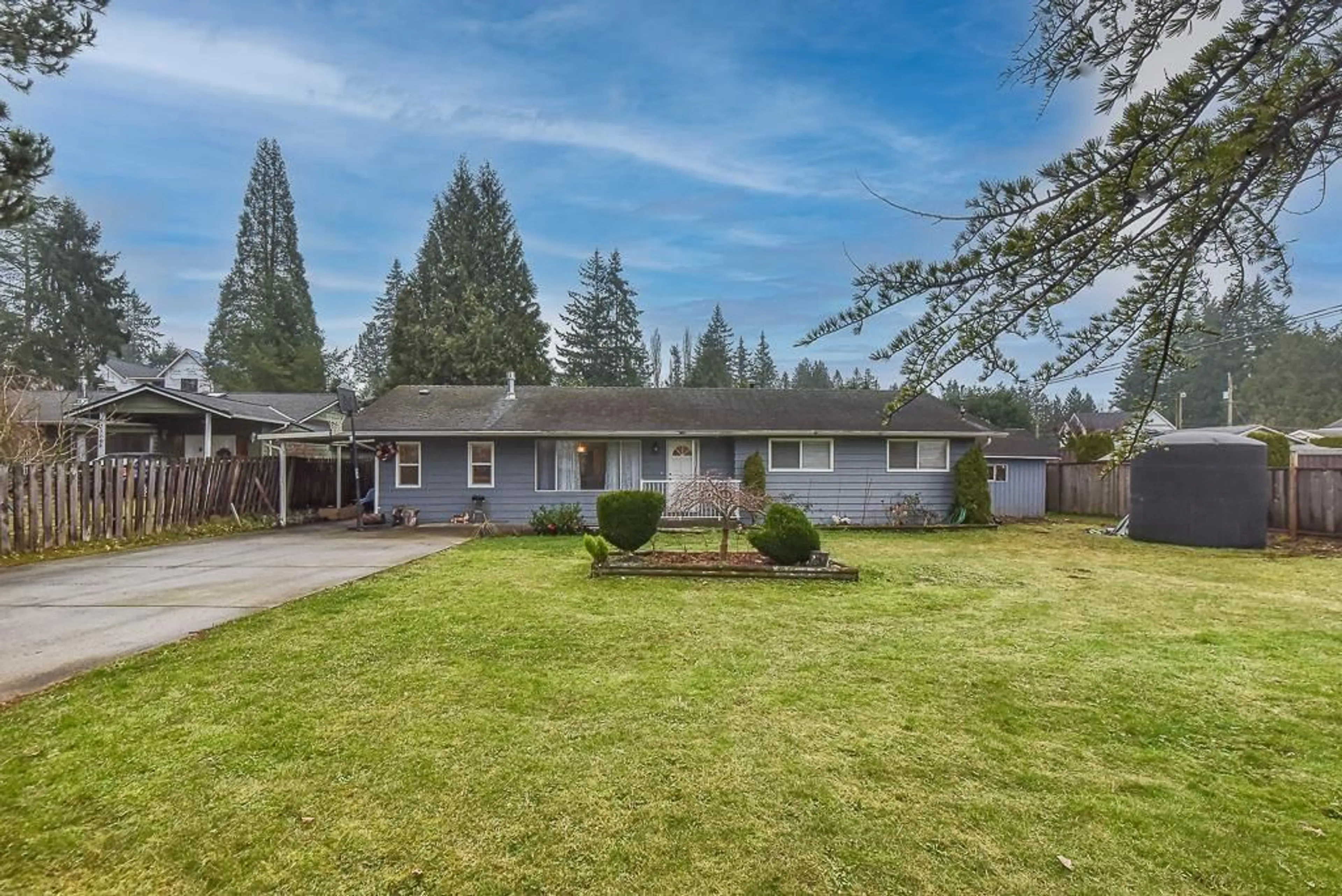 Home with vinyl exterior material, street for 23740 FRASER HIGHWAY, Langley British Columbia V2Z2K8