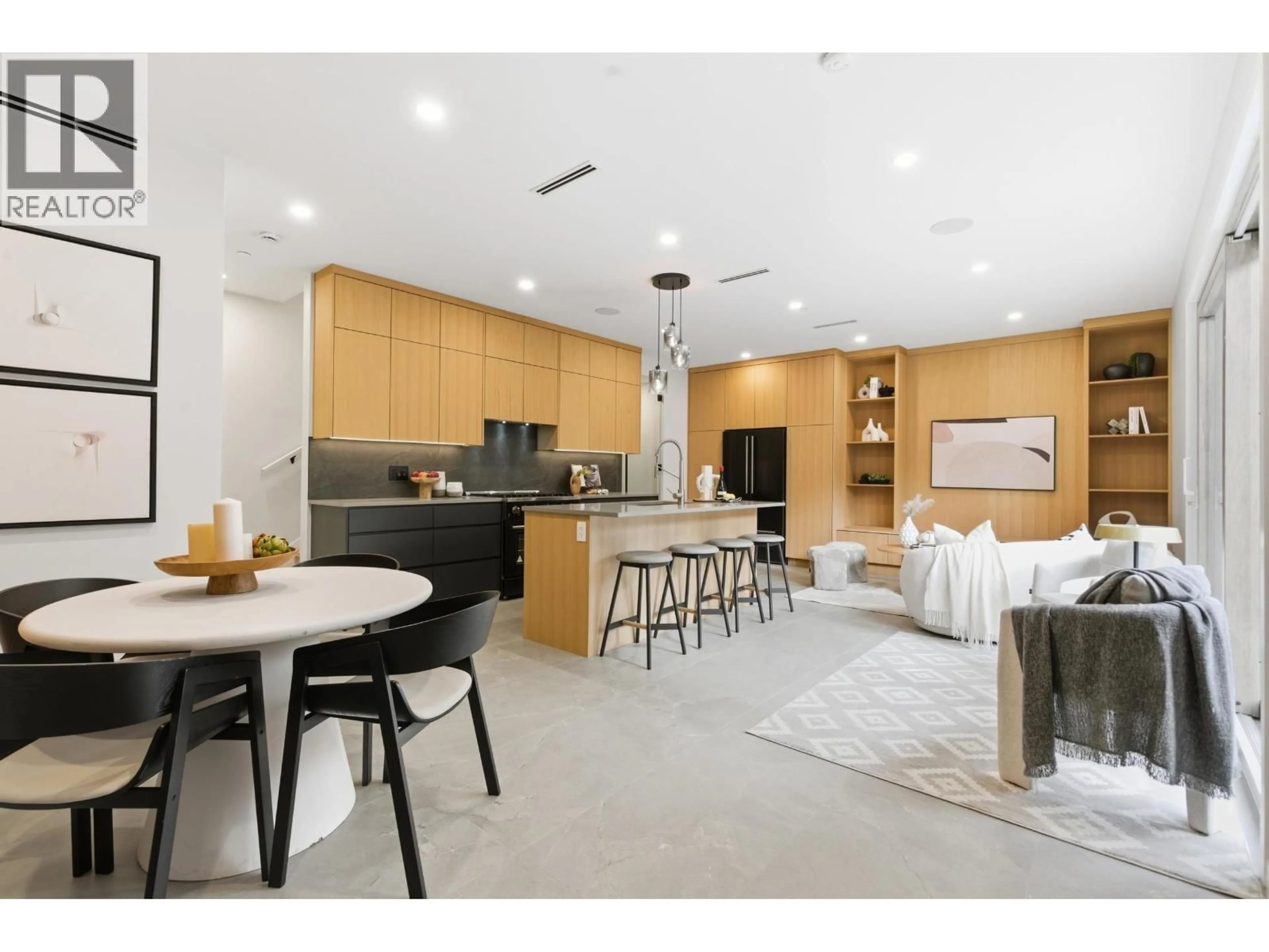 Open concept kitchen, ceramic/tile floor for 1 - 2091 20TH AVENUE, Vancouver British Columbia V5N2L1
