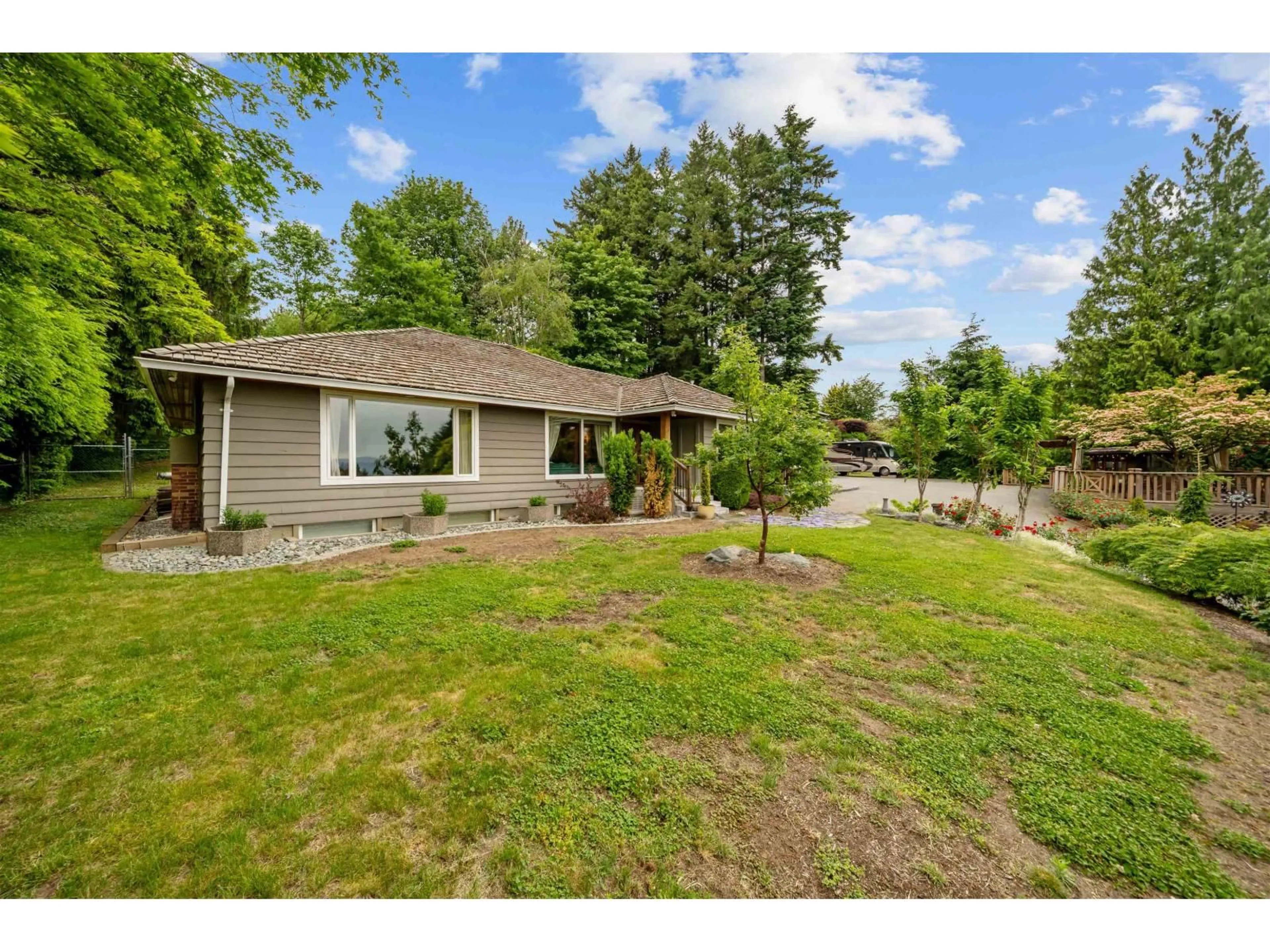 A pic from outside/outdoor area/front of a property/back of a property/a pic from drone, water/lake/river/ocean view for 8054 SYKES STREET, Mission British Columbia V2V3W2