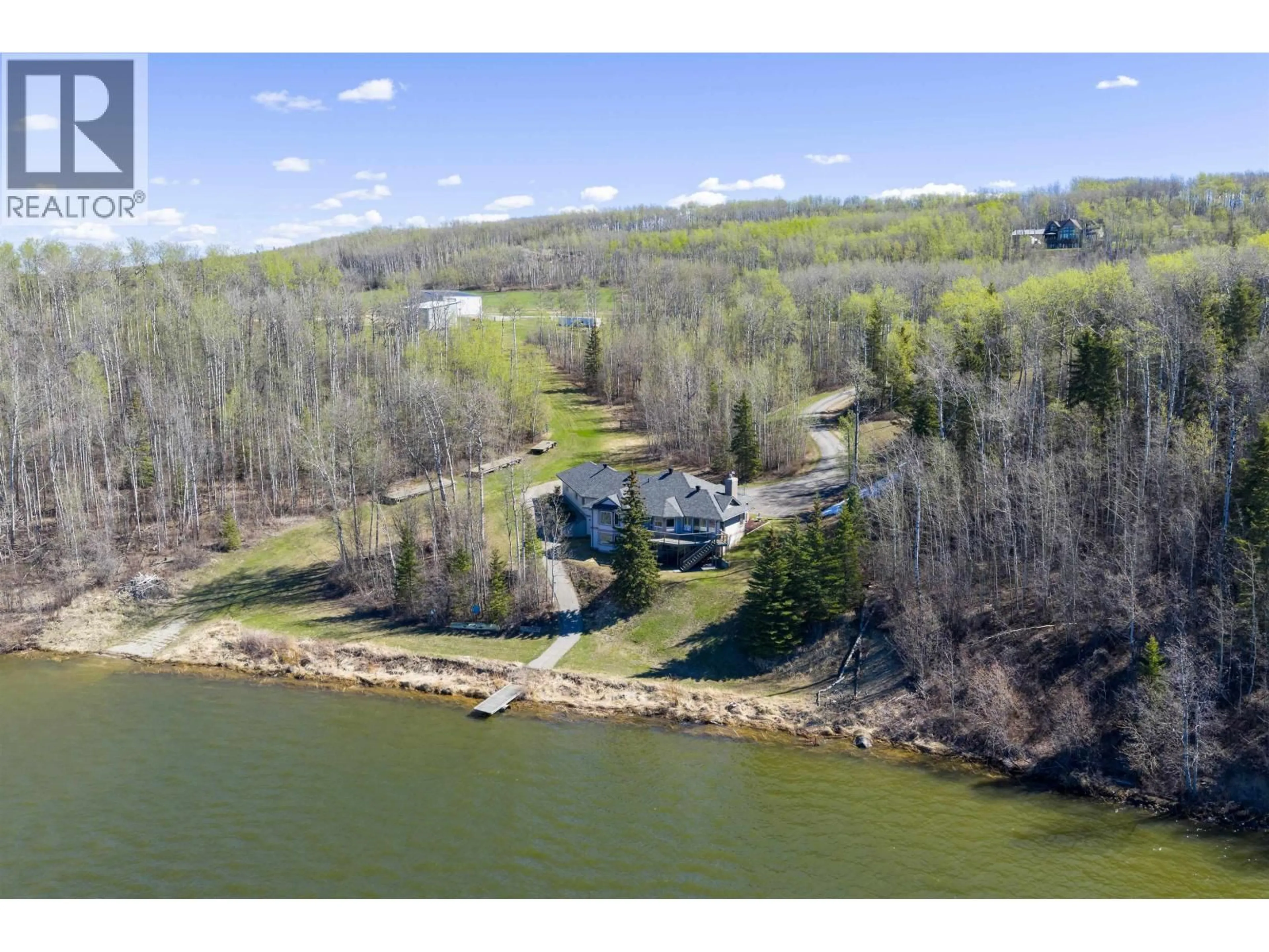 A pic from outside/outdoor area/front of a property/back of a property/a pic from drone, water/lake/river/ocean view for 13499 SUNNYSIDE COVE, Charlie Lake British Columbia V0C1H0