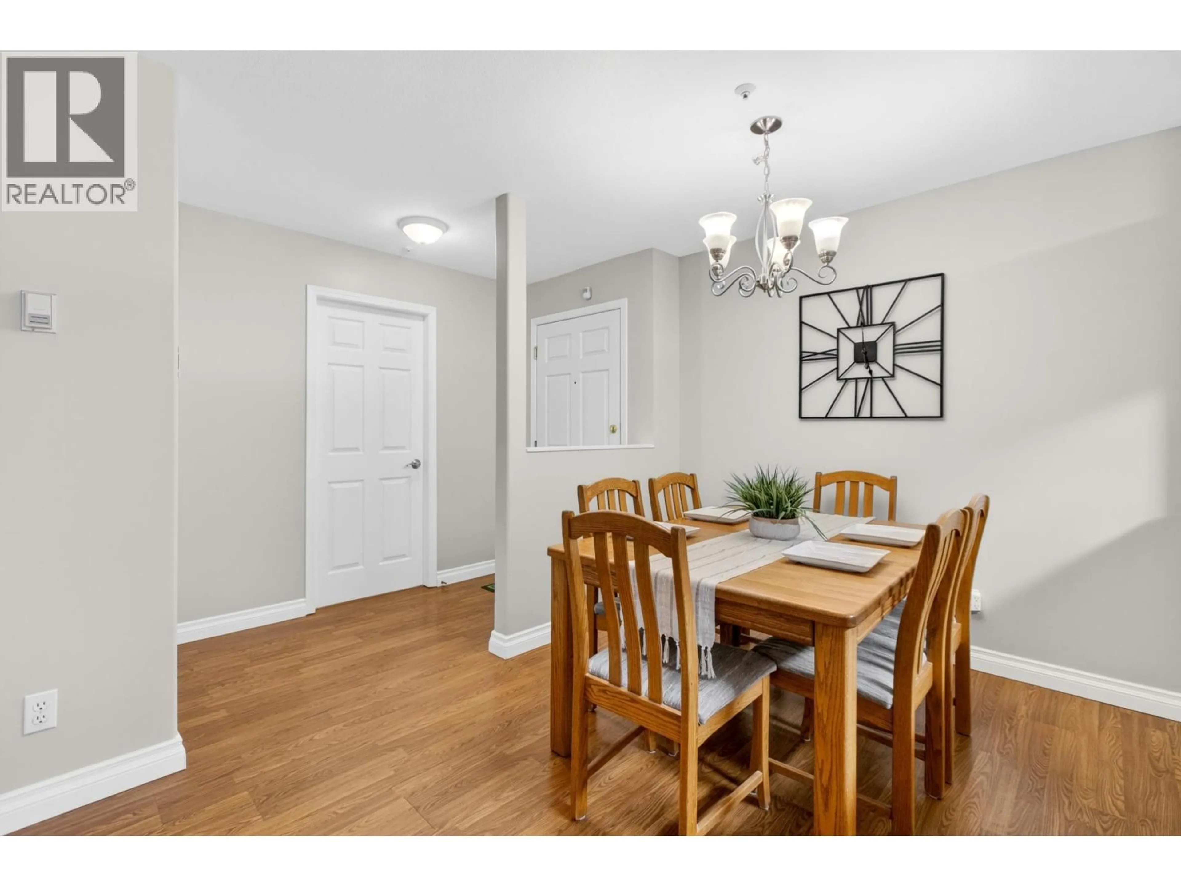 Dining room, wood/laminate floor for 103 - 11960 HARRIS ROAD, Pitt Meadows British Columbia V3Y2R1