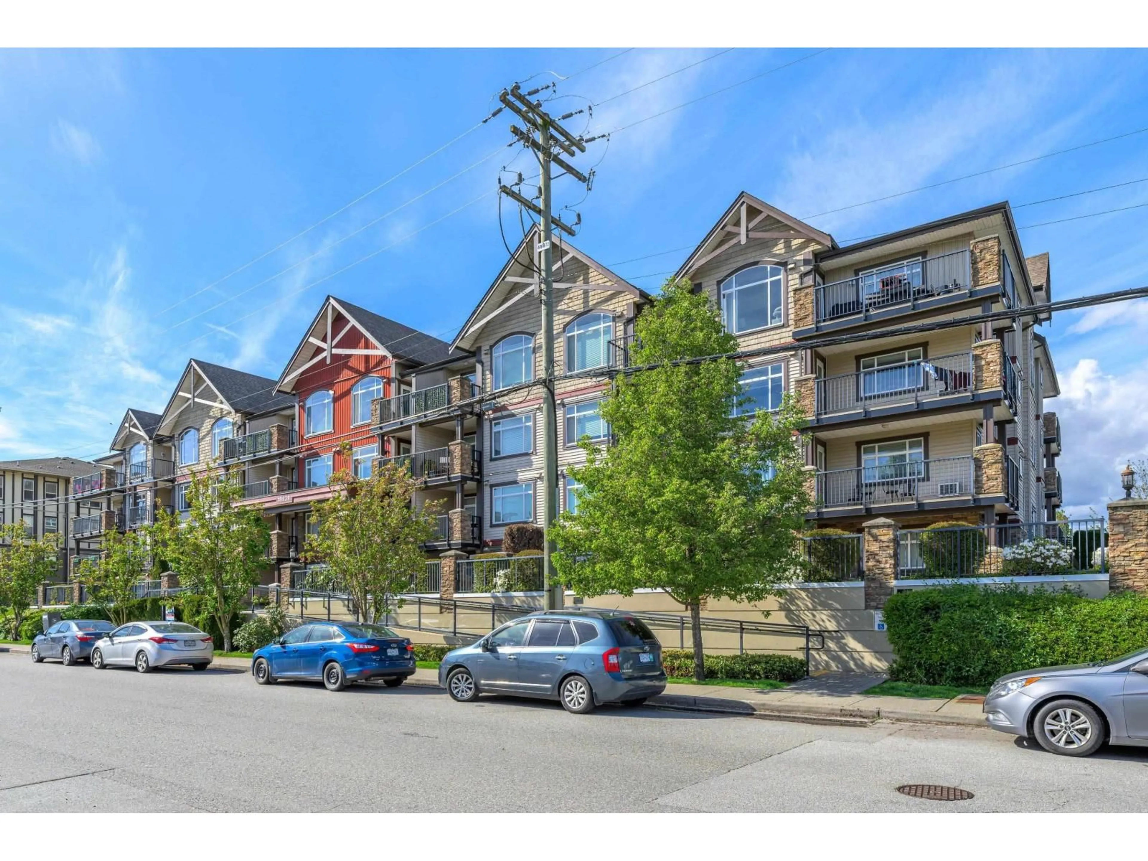 A pic from outside/outdoor area/front of a property/back of a property/a pic from drone, mountain view for 317 - 19939 55A AVENUE, Langley British Columbia V4P1R9