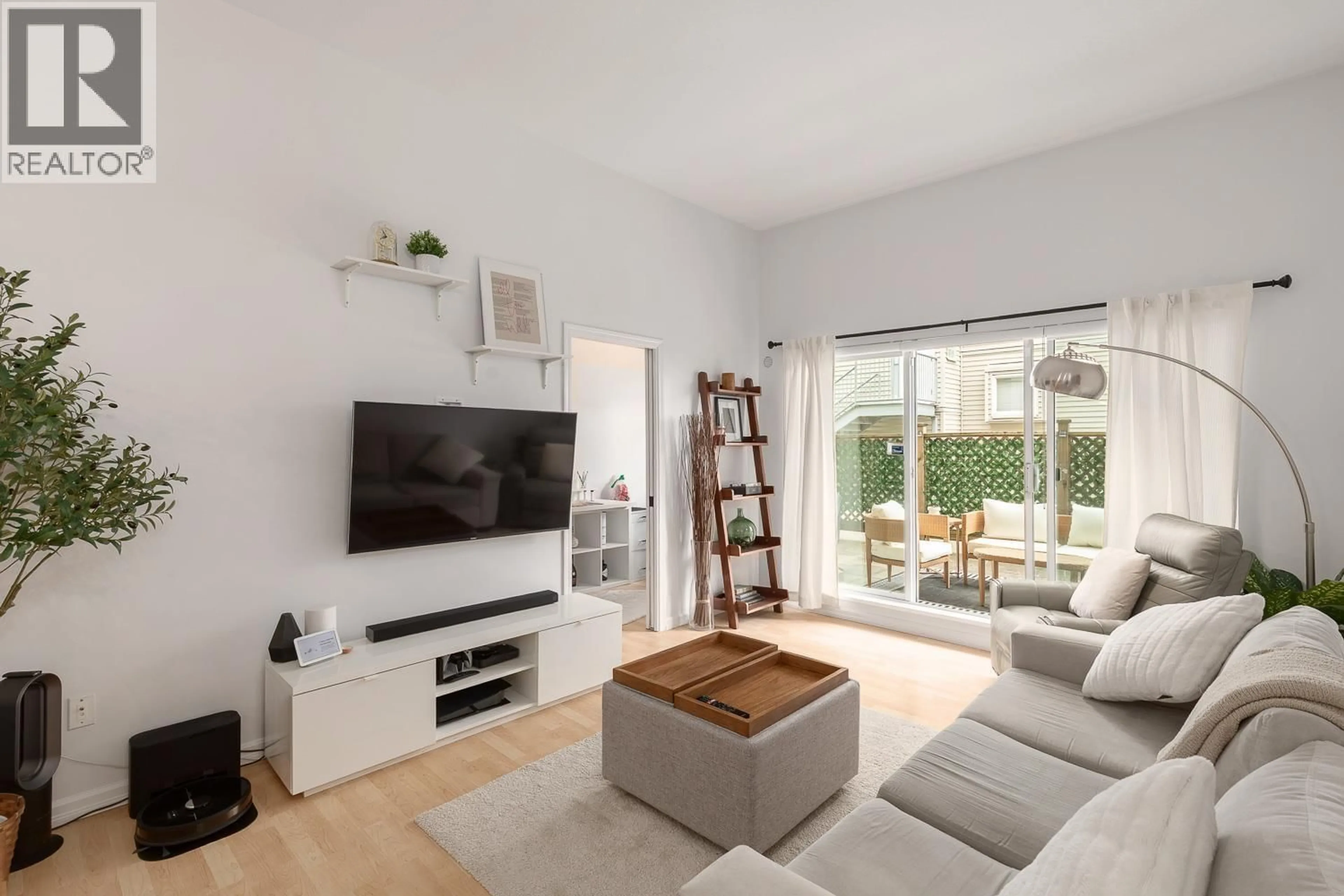 Living room with furniture, unknown for 204 - 7031 BLUNDELL ROAD, Richmond British Columbia V6Y1J5