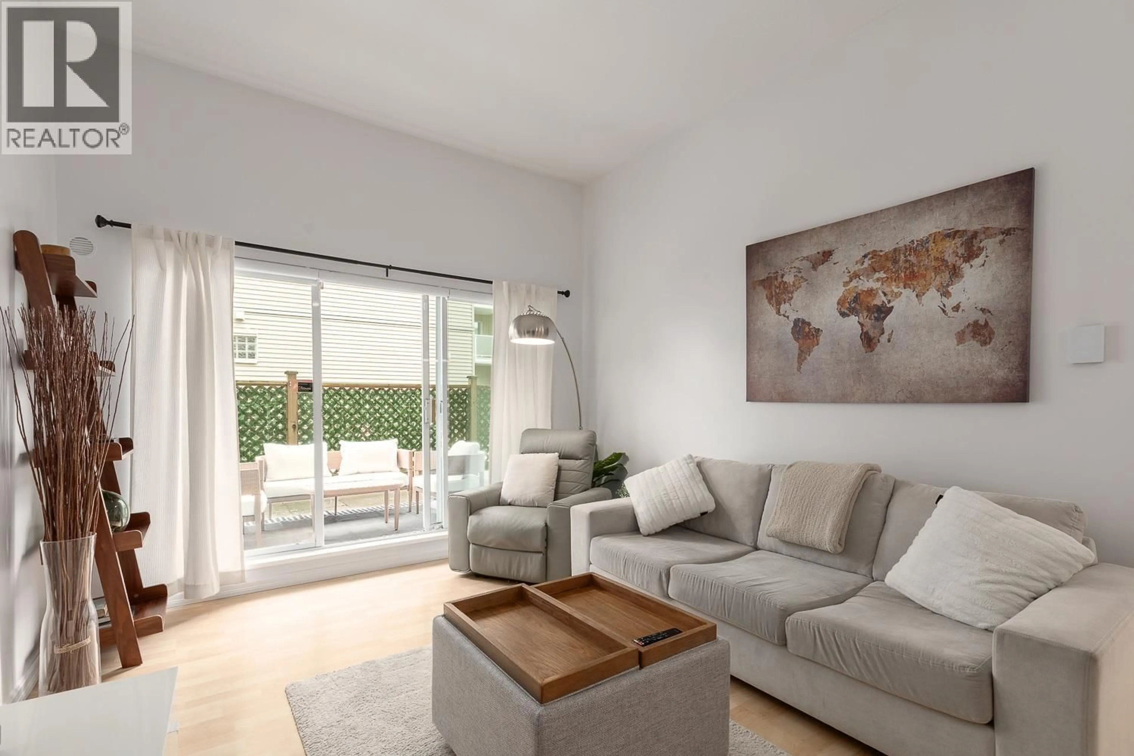 Living room with furniture, unknown for 204 - 7031 BLUNDELL ROAD, Richmond British Columbia V6Y1J5