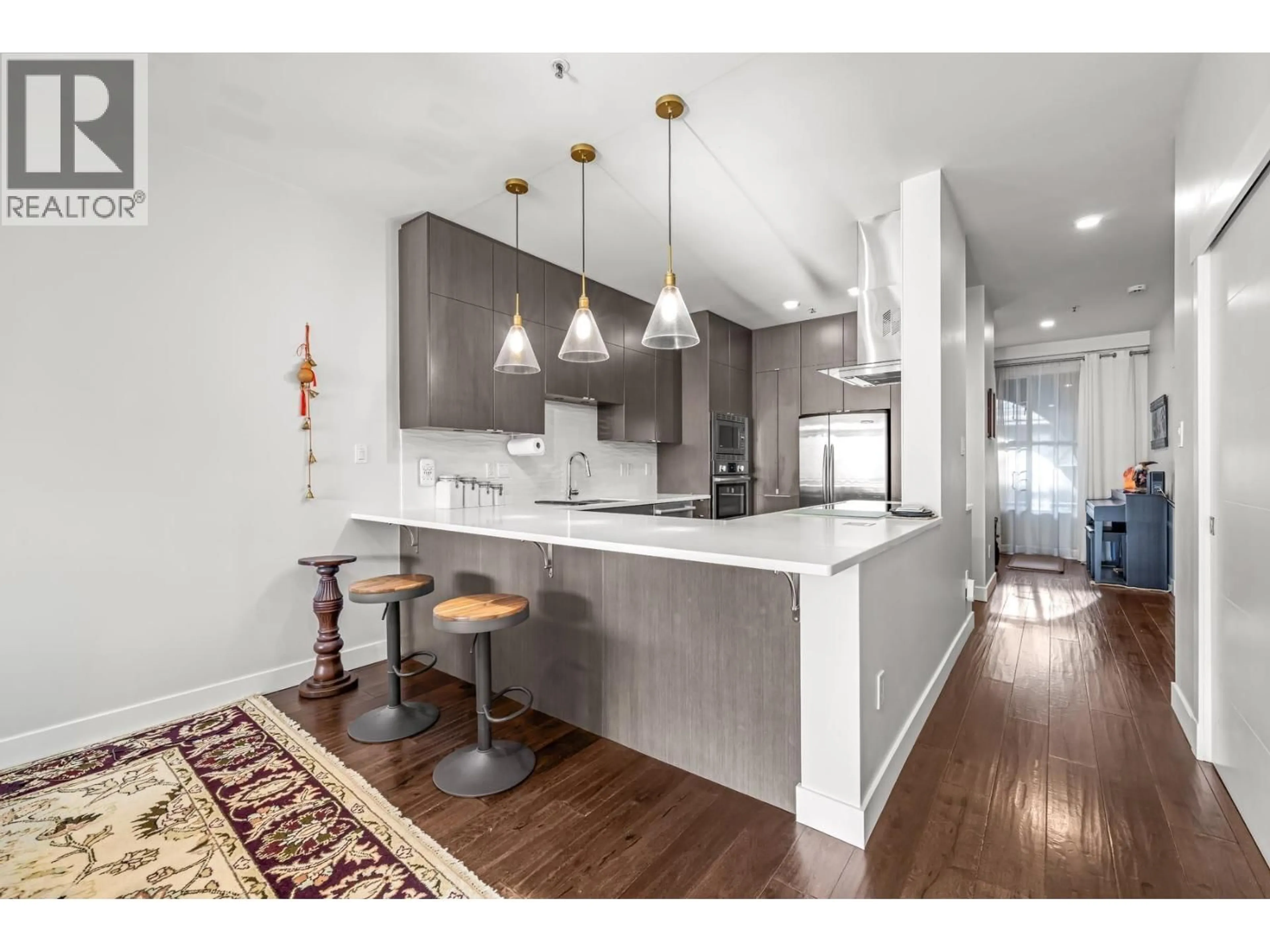 Open concept kitchen, wood/laminate floor for 204 - 2 RENAISSANCE SQUARE, New Westminster British Columbia V3M6K3