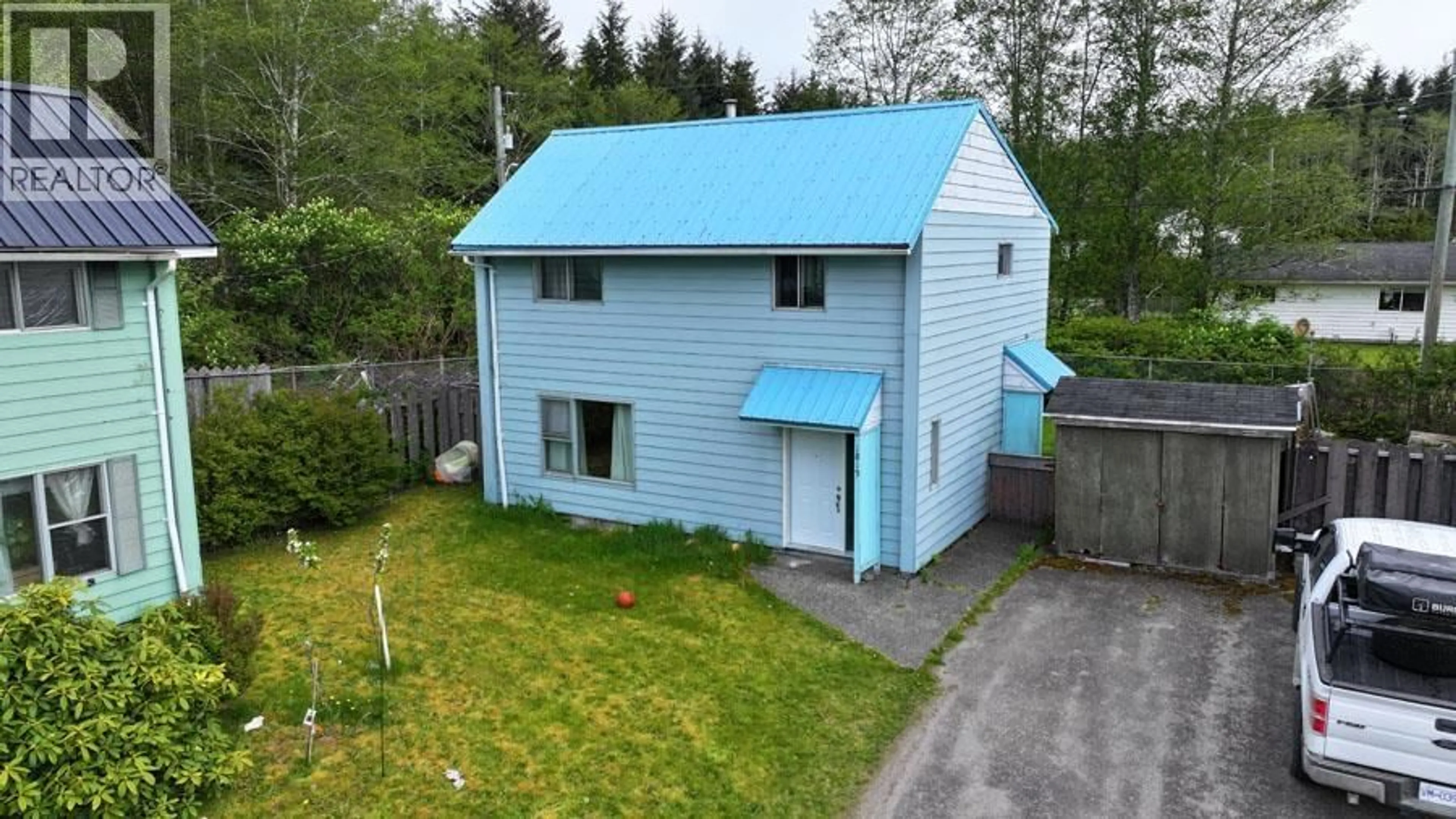 A pic from outside/outdoor area/front of a property/back of a property/a pic from drone, building for 1819 CEDAR CRESCENT, Masset British Columbia V0T1M0