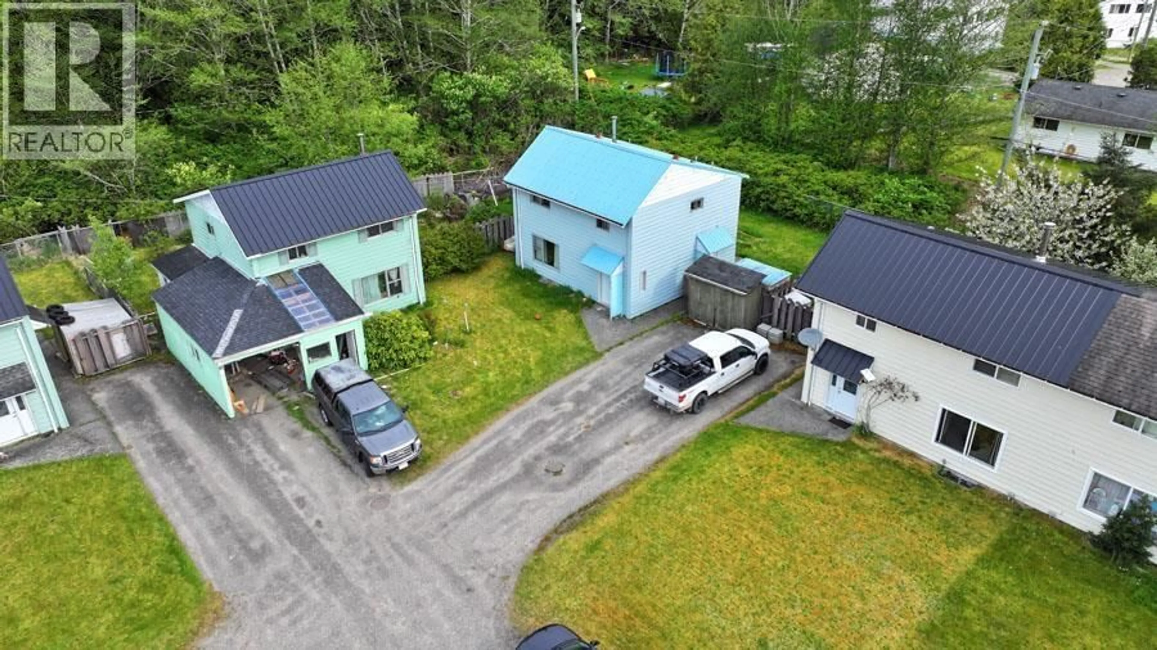 A pic from outside/outdoor area/front of a property/back of a property/a pic from drone, street for 1819 CEDAR CRESCENT, Masset British Columbia V0T1M0