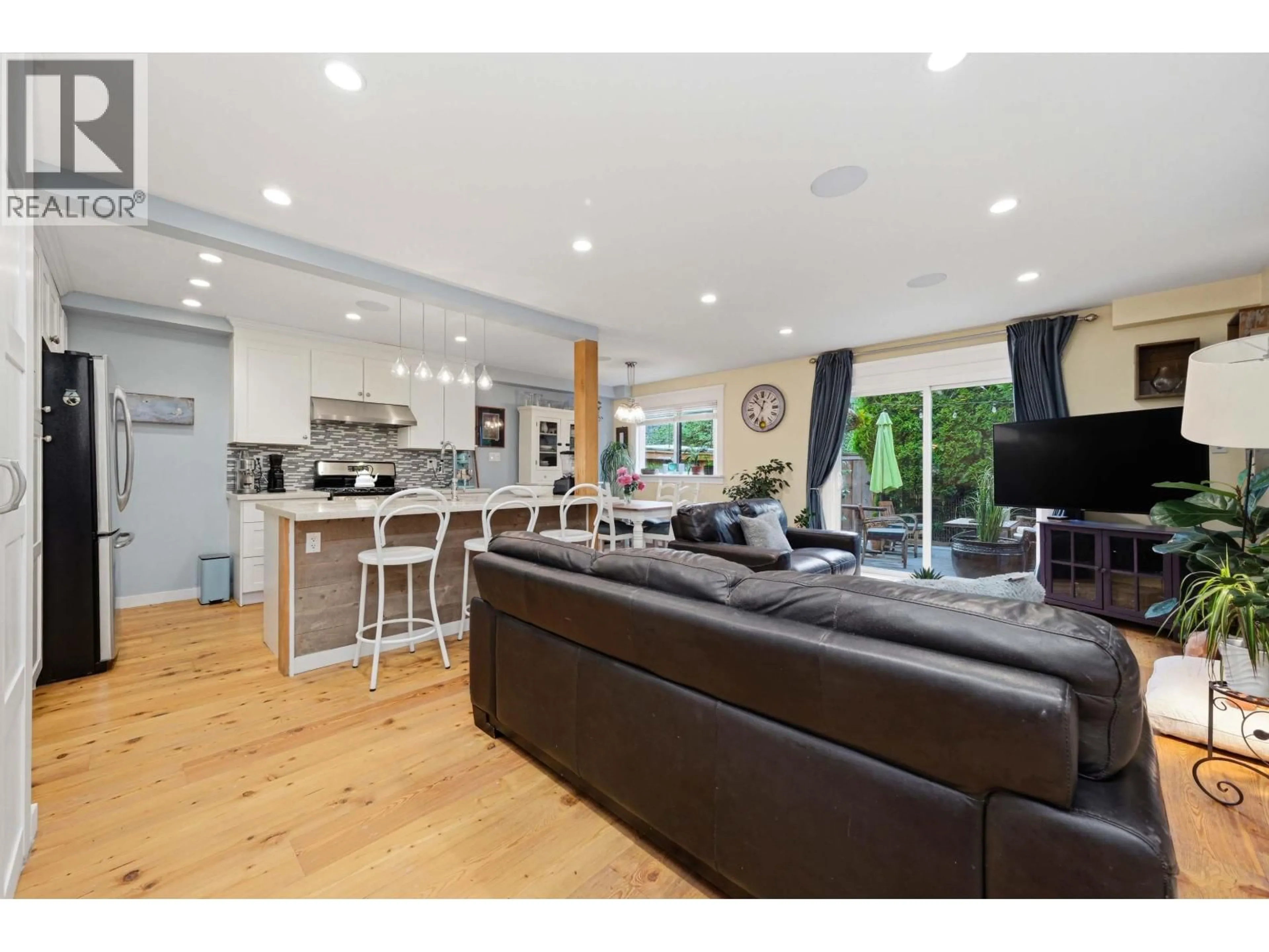 Open concept kitchen, wood/laminate floor for 1126 PREMIER STREET, North Vancouver British Columbia V7J2H3