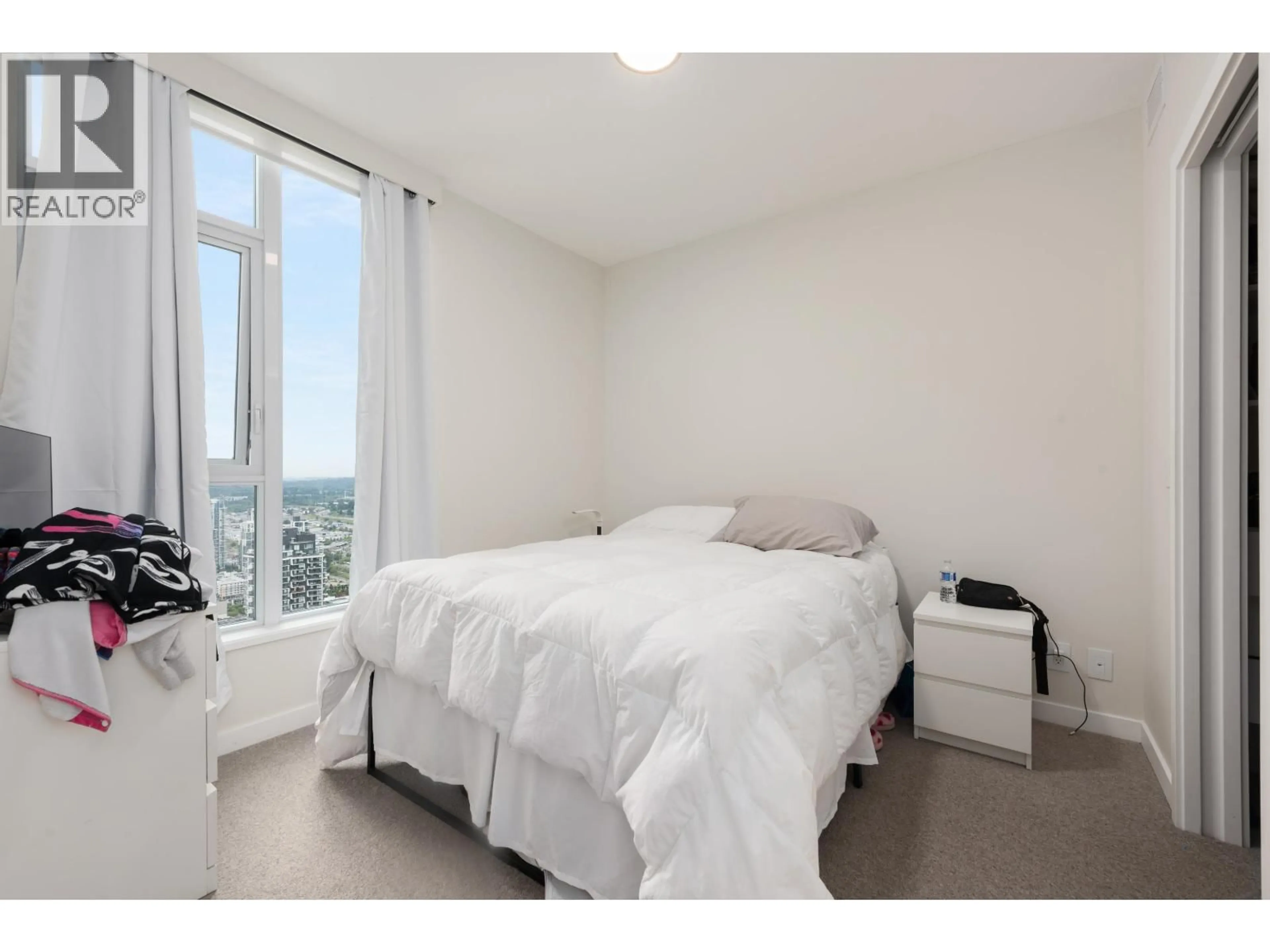 Bedroom with bed, unknown for 5303 - 2108 GILMORE AVENUE, Burnaby British Columbia V5C0N8