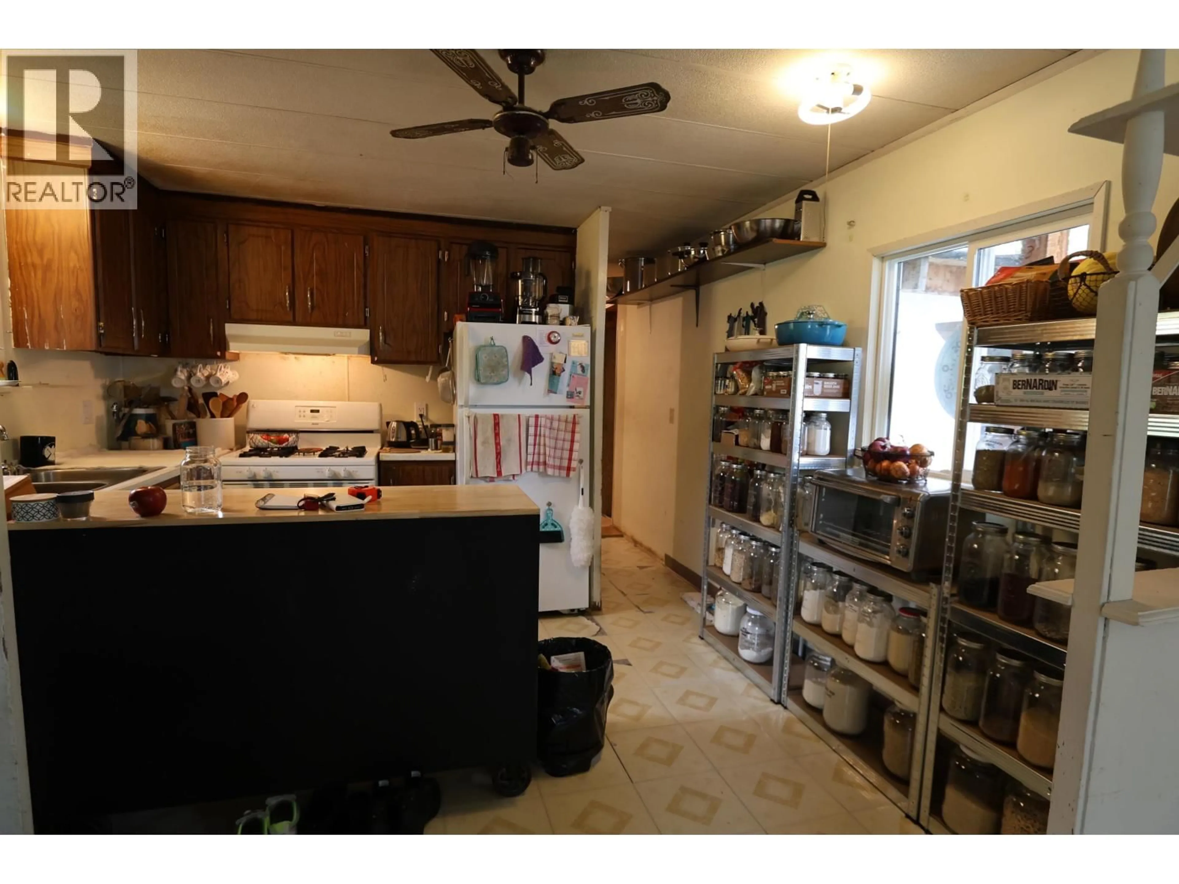 Standard kitchen, ceramic/tile floor for 3270 MUERMANN ROAD, Prince George British Columbia V2K5X1