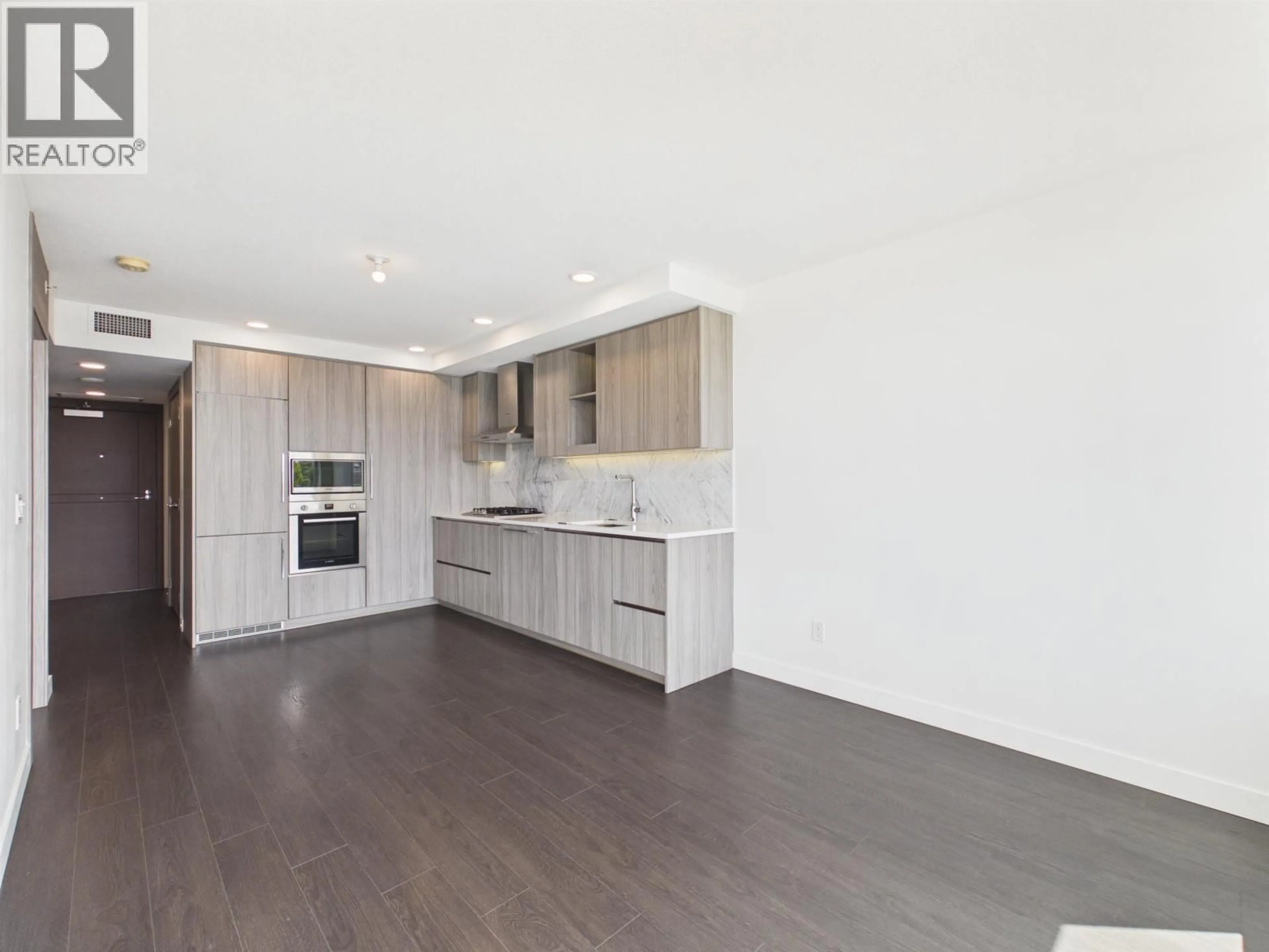 Open concept kitchen, wood/laminate floor for 615 - 3300 KETCHESON ROAD, Richmond British Columbia V6X0S5