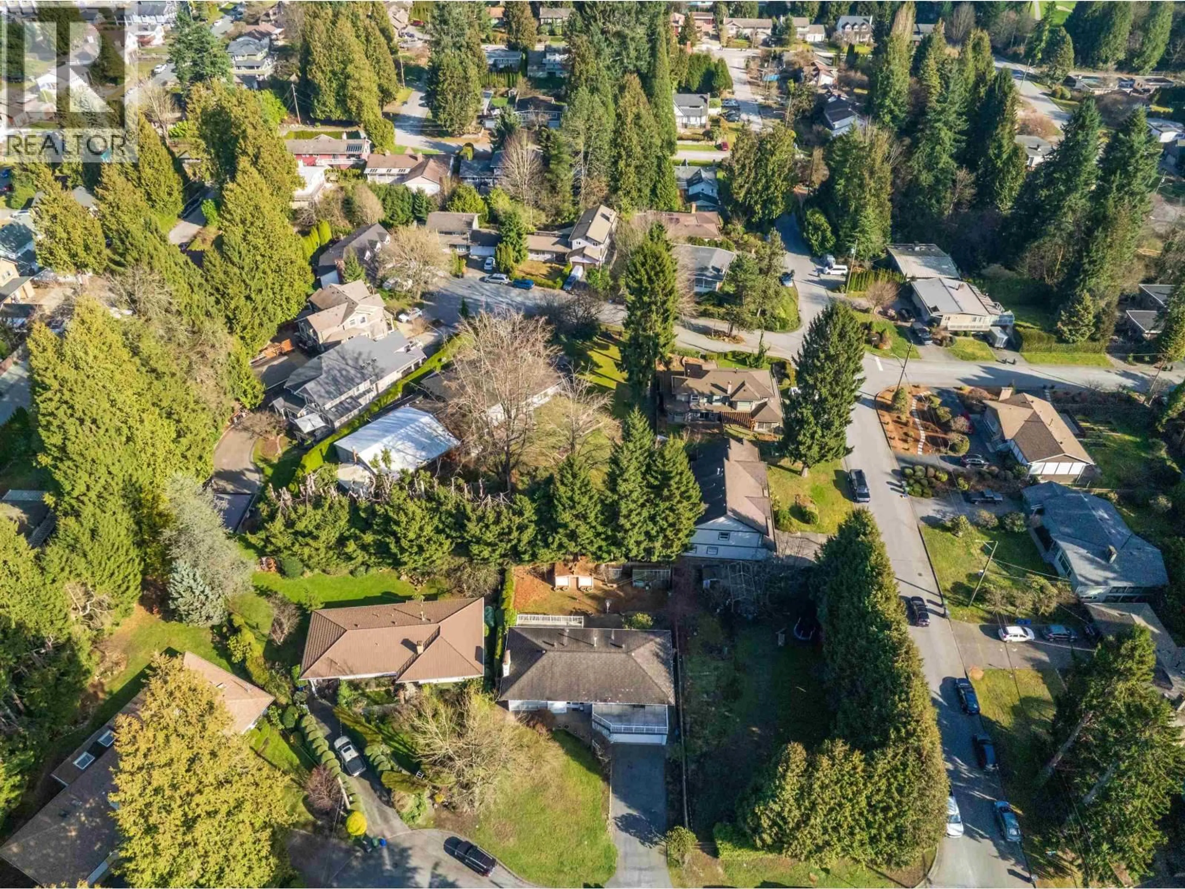 A pic from outside/outdoor area/front of a property/back of a property/a pic from drone, street for 525 PERTH AVENUE, Coquitlam British Columbia V3J7V1
