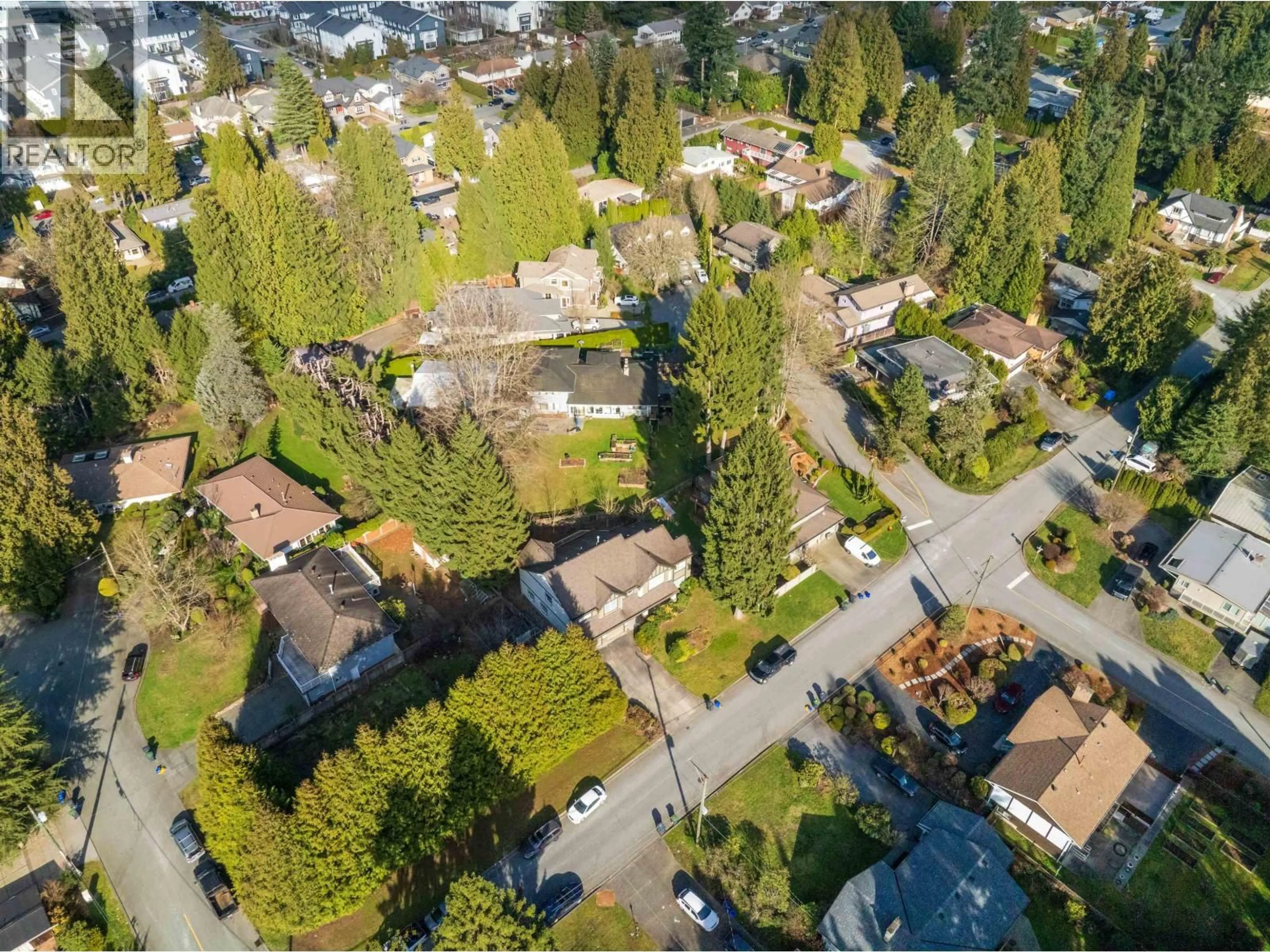 A pic from outside/outdoor area/front of a property/back of a property/a pic from drone, street for 525 PERTH AVENUE, Coquitlam British Columbia V3J7V1
