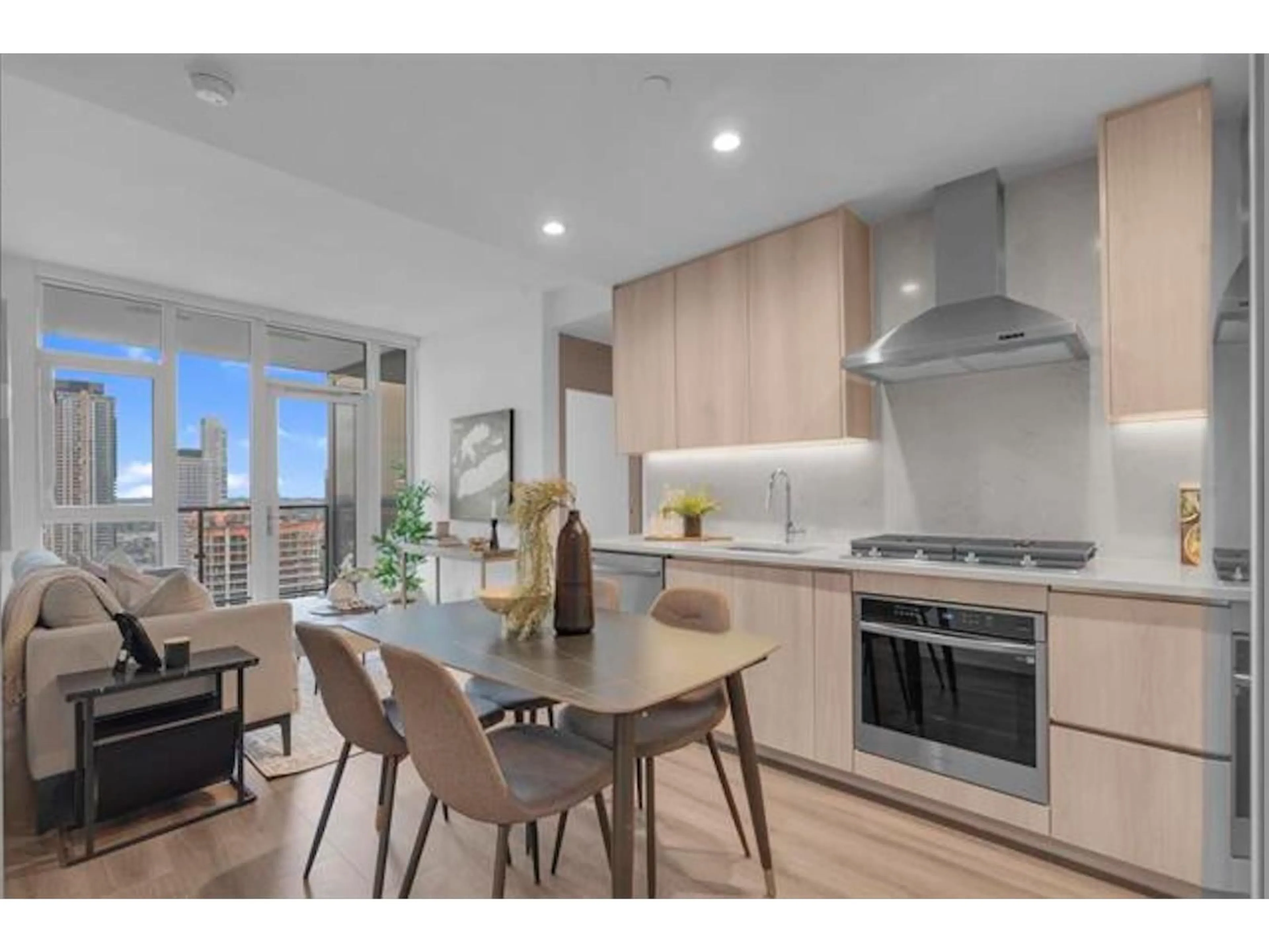 Open concept kitchen, wood/laminate floor for 1705 - 10750 135A STREET, Surrey British Columbia V3W4E8