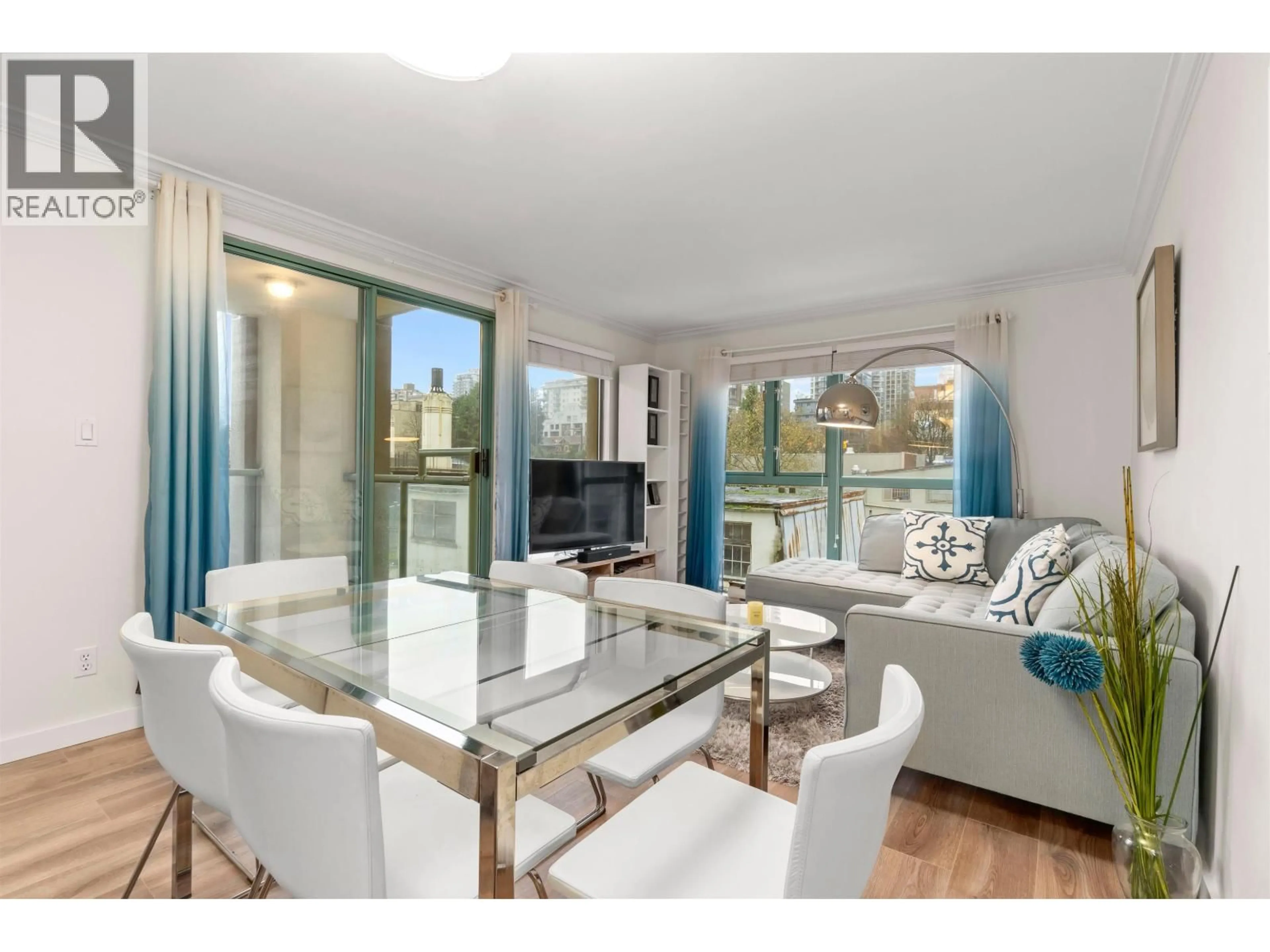 Living room with furniture, wood/laminate floor for 506 - 907 BEACH AVENUE, Vancouver British Columbia V6Z2R3