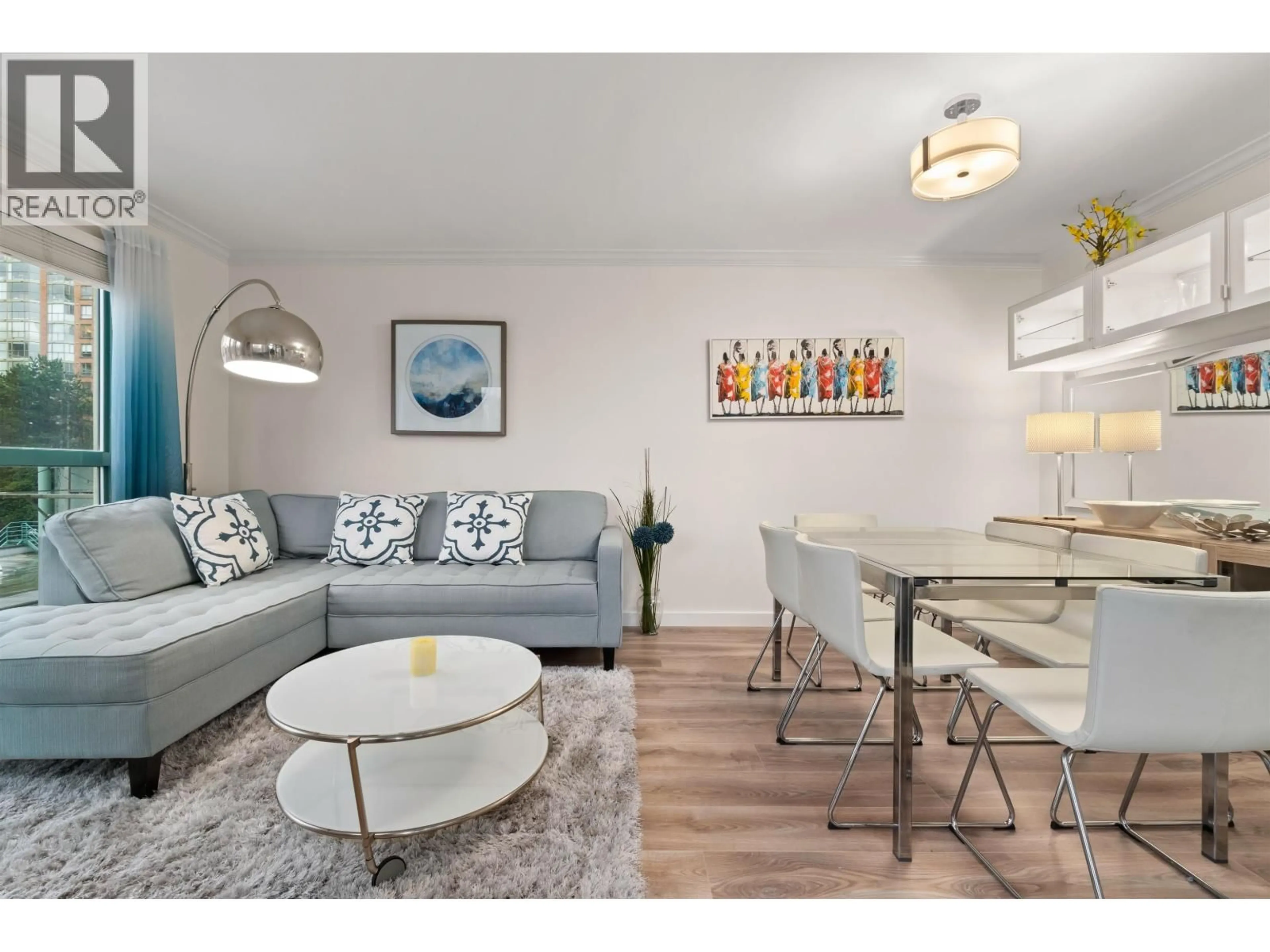 Living room with furniture, wood/laminate floor for 506 - 907 BEACH AVENUE, Vancouver British Columbia V6Z2R3