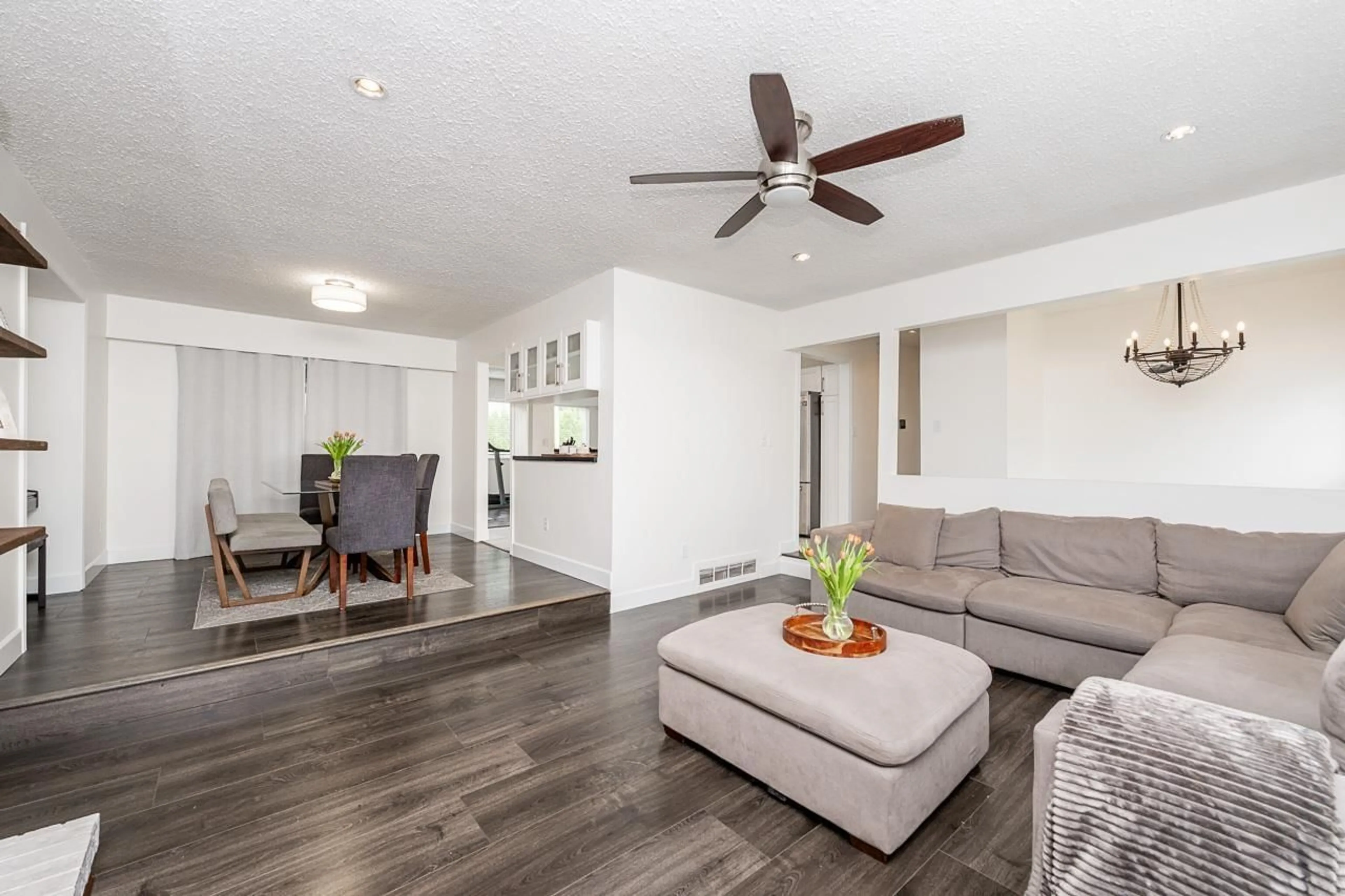 Living room with furniture, wood/laminate floor for 11792 80A AVENUE, Delta British Columbia V4C7T9