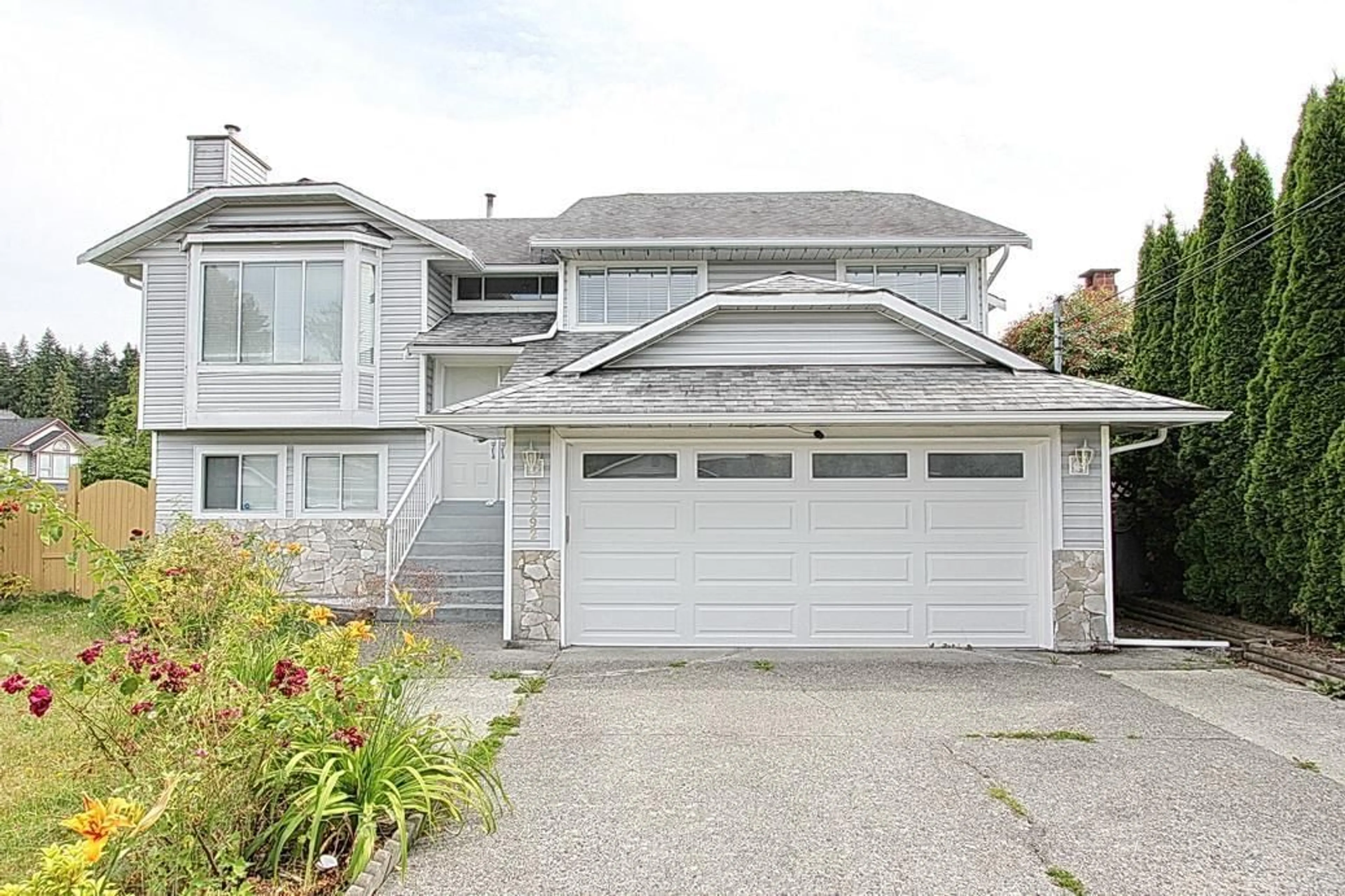 Home with vinyl exterior material, street for 15292 94 AVENUE, Surrey British Columbia V3R1E3
