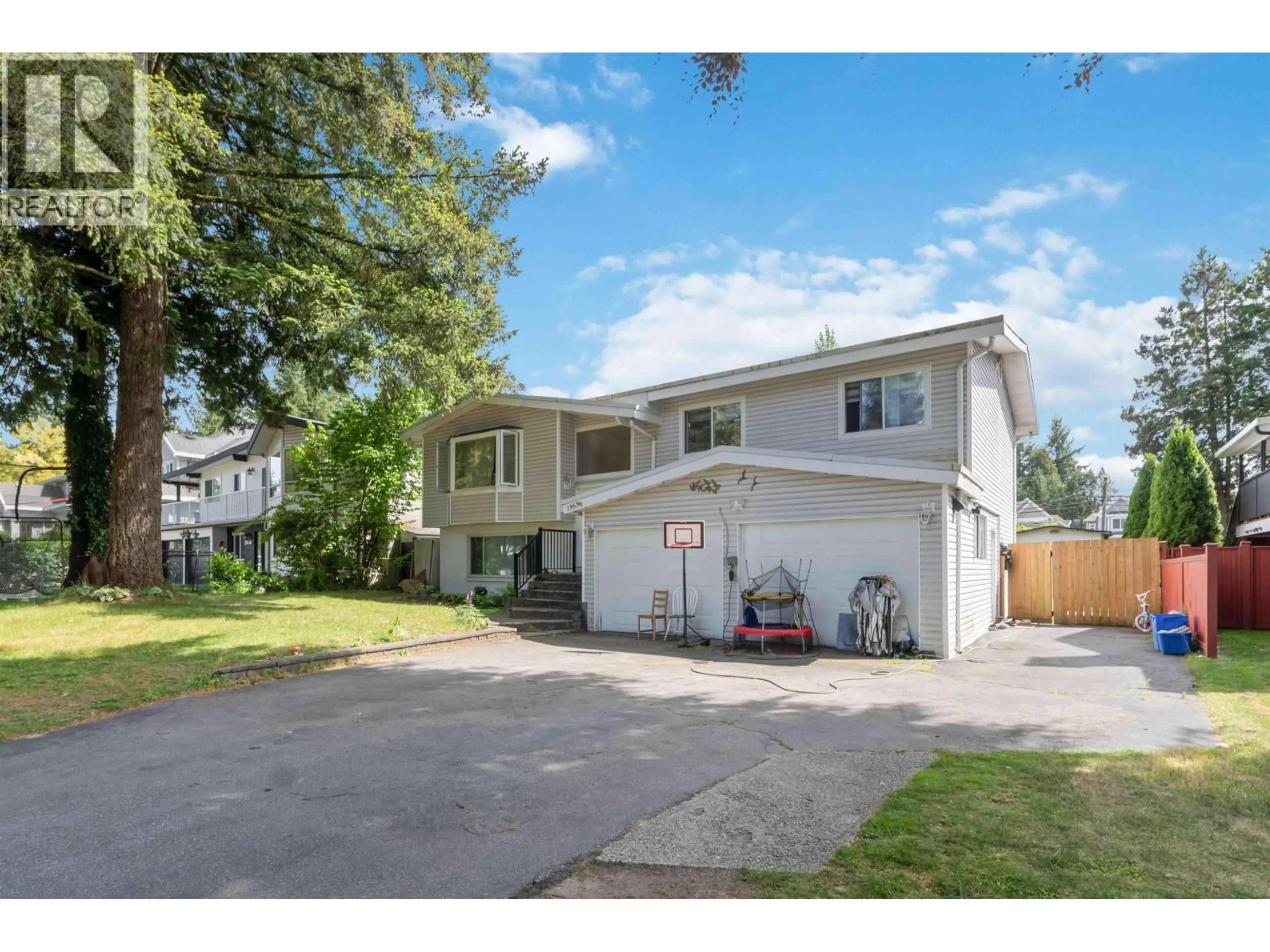 Home with vinyl exterior material, street for 19536 118B AVENUE, Pitt Meadows British Columbia V3Y1L3