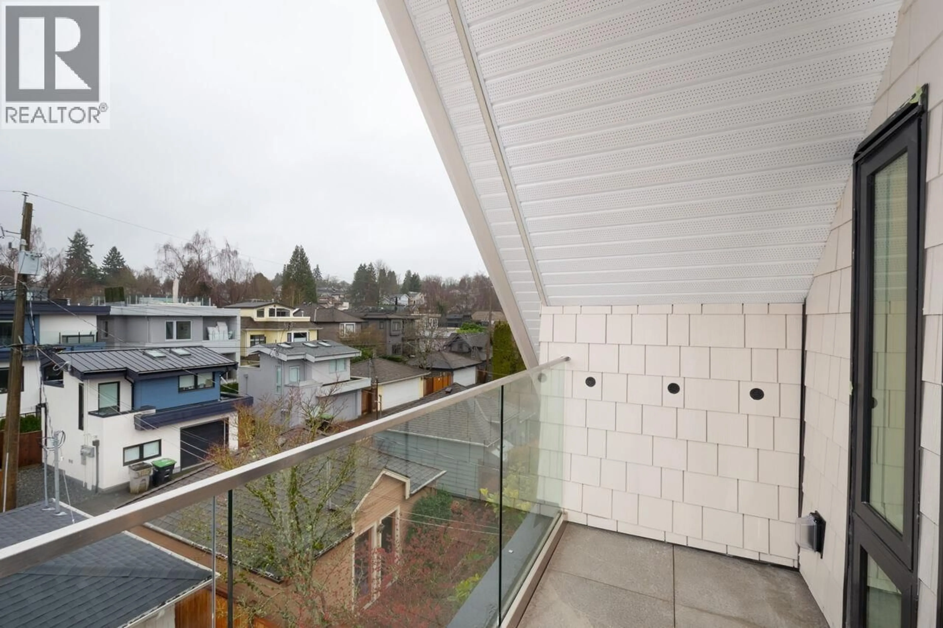Patio, city buildings view from balcony for 4424 4TH AVENUE, Vancouver British Columbia V6R1R1