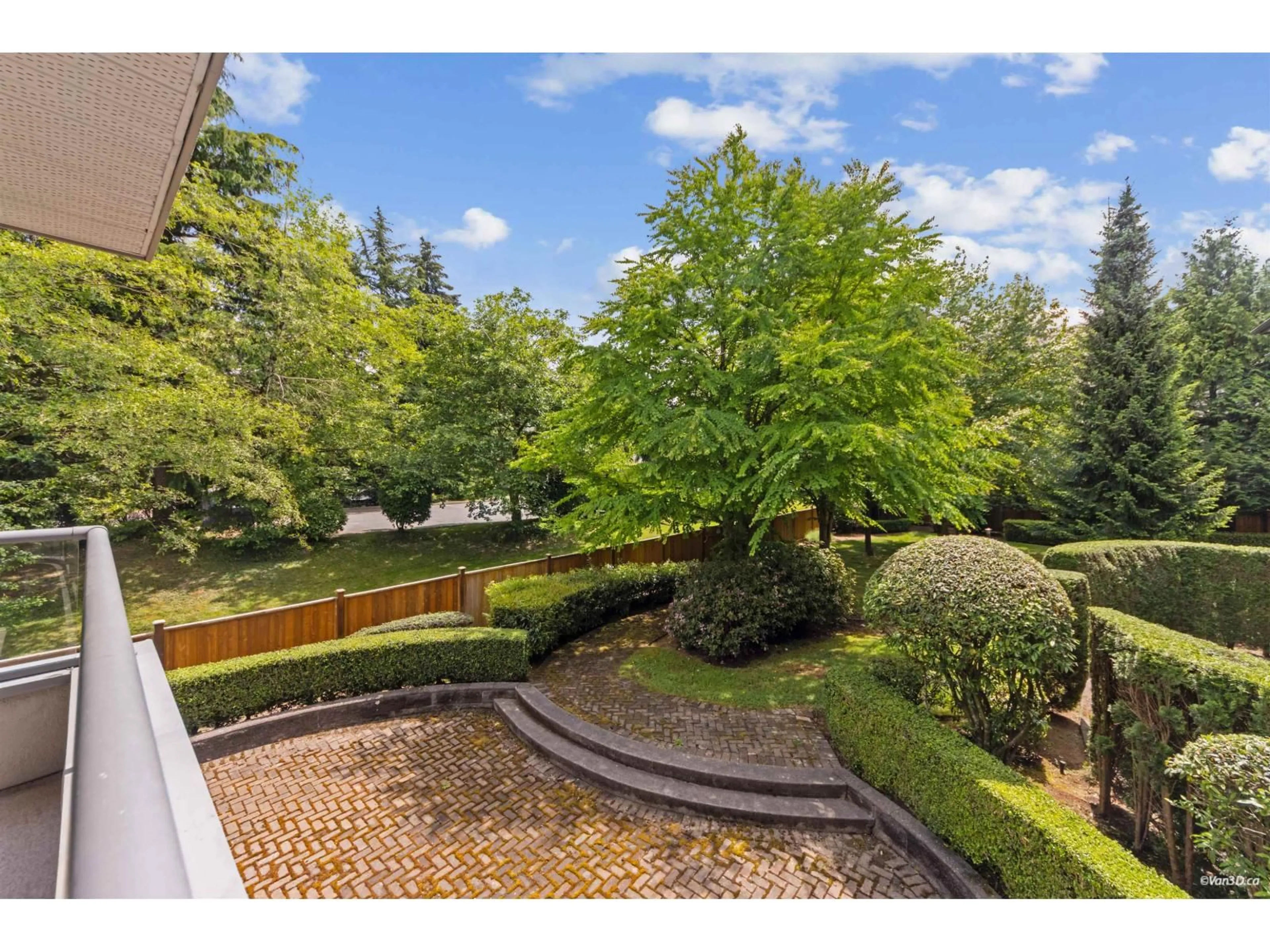 Patio, forest/trees view for 206 - 7475 138 STREET, Surrey British Columbia V3W0Y9