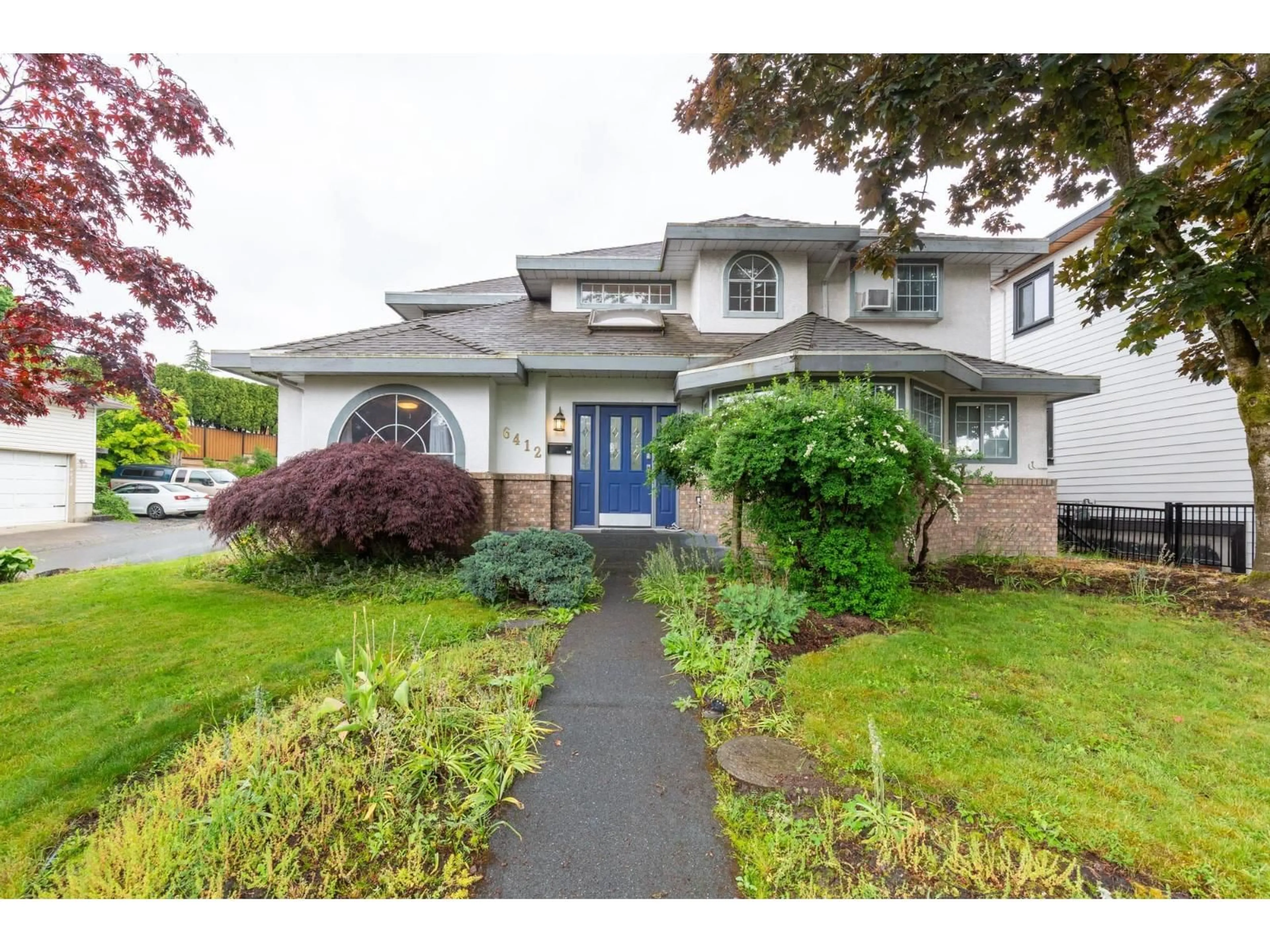 A pic from outside/outdoor area/front of a property/back of a property/a pic from drone, street for 6412 179 STREET, Surrey British Columbia V3S7J9