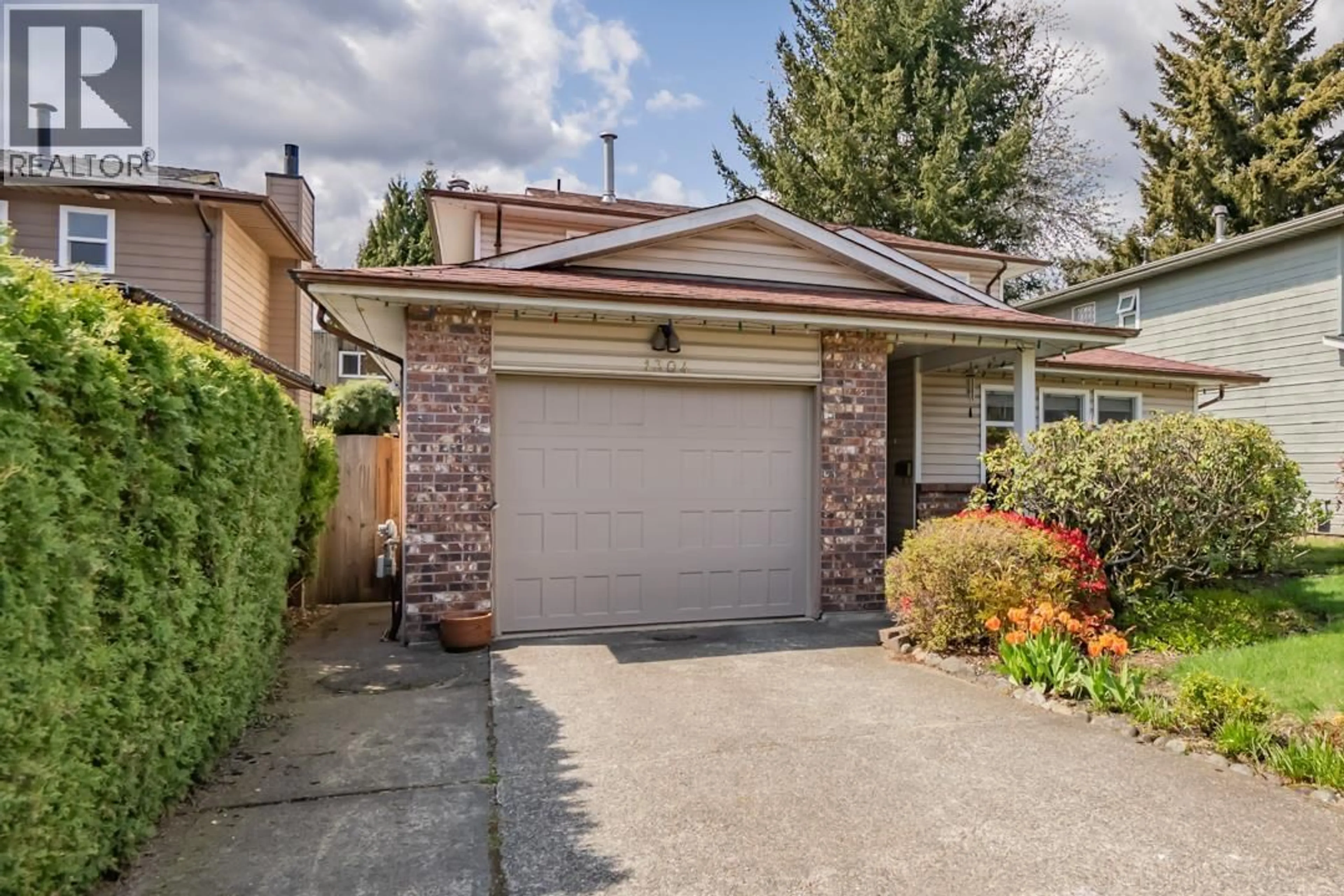 Home with brick exterior material, street for 1304 HORNBY STREET, Coquitlam British Columbia V3E1V4