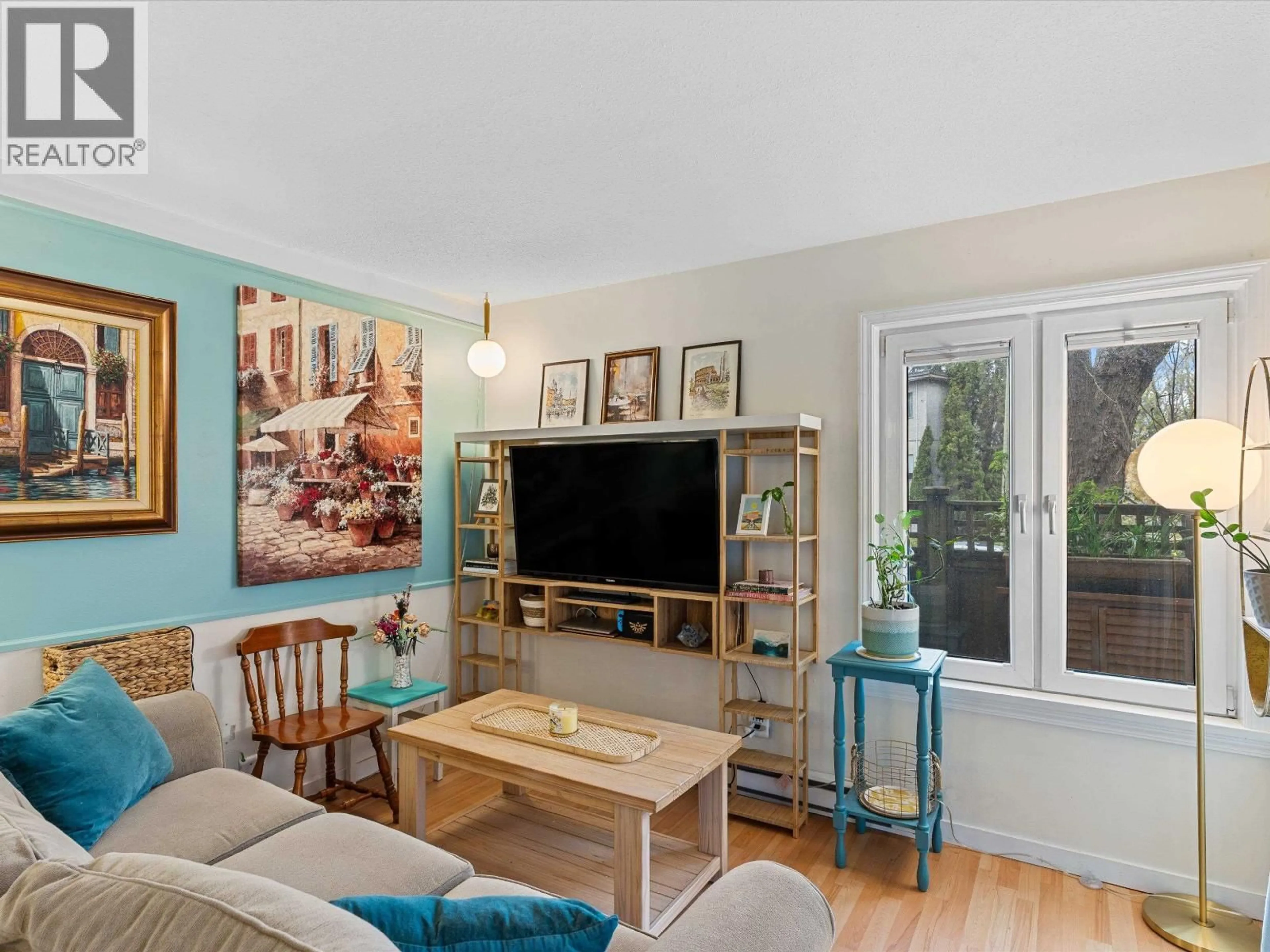 Living room with furniture, wood/laminate floor for 109 - 1450 7TH AVENUE, Vancouver British Columbia V5N1R8