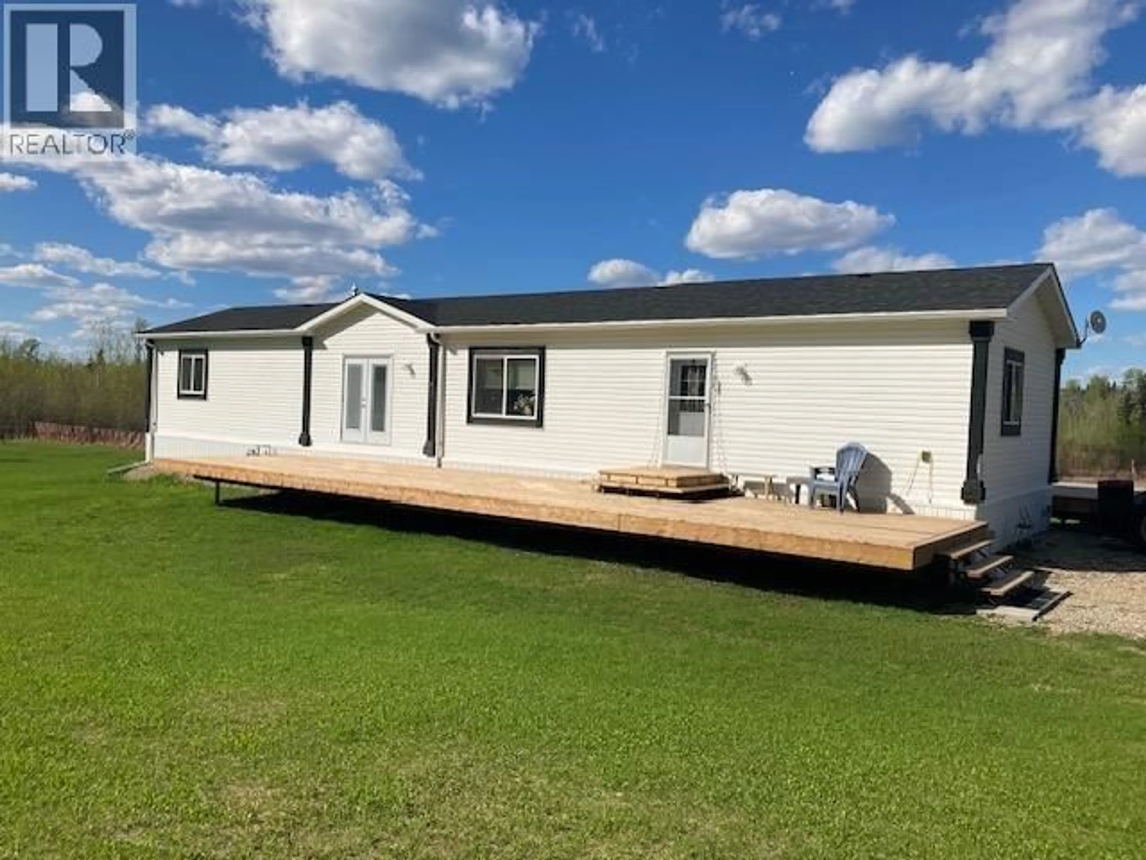 Home with vinyl exterior material, building for 14398 RED CREEK ROAD, Charlie Lake British Columbia V1J8L8