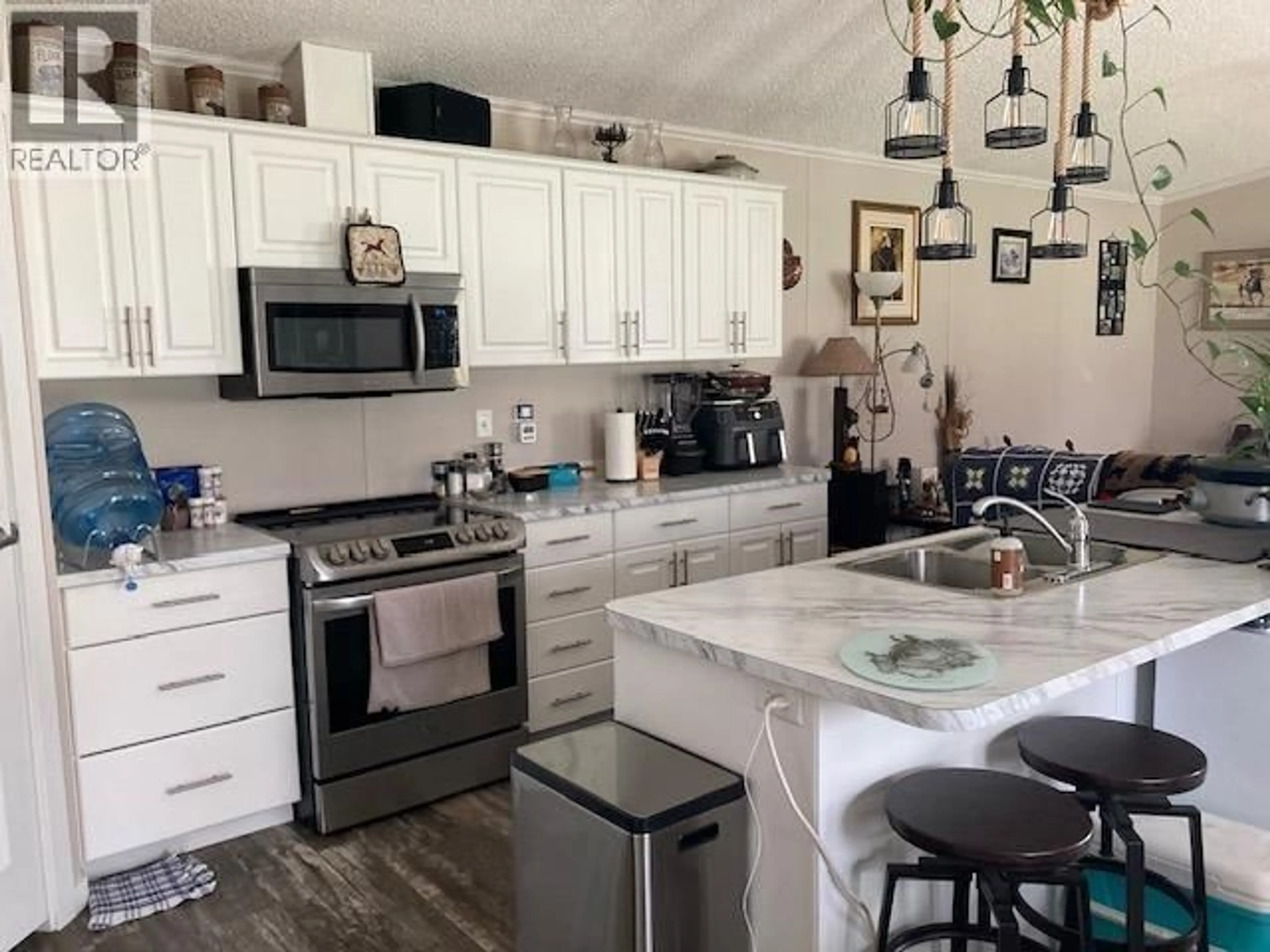 Open concept kitchen, unknown for 14398 RED CREEK ROAD, Charlie Lake British Columbia V1J8L8