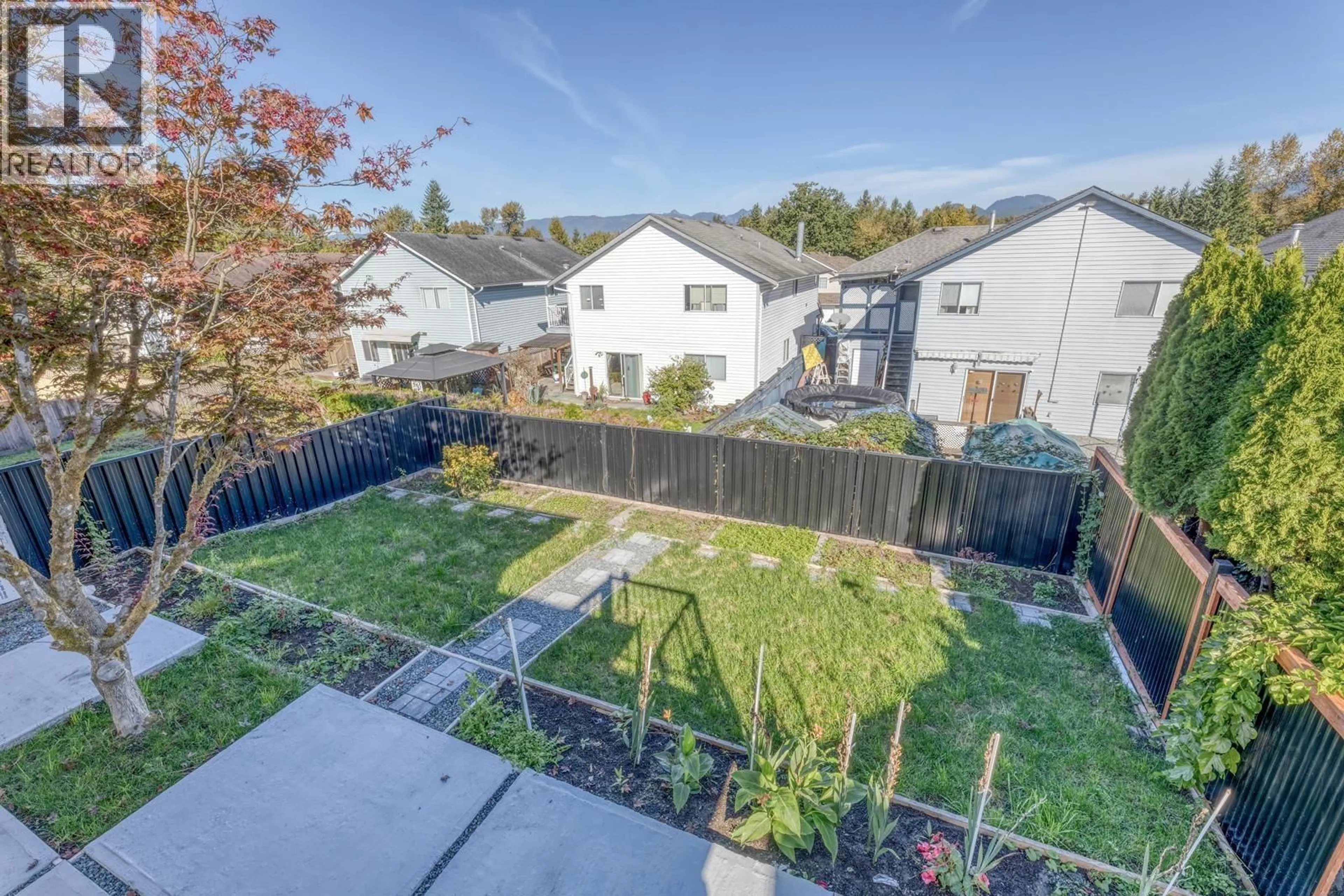 A pic from outside/outdoor area/front of a property/back of a property/a pic from drone, street for 22419 125 AVENUE, Maple Ridge British Columbia V2X9N8