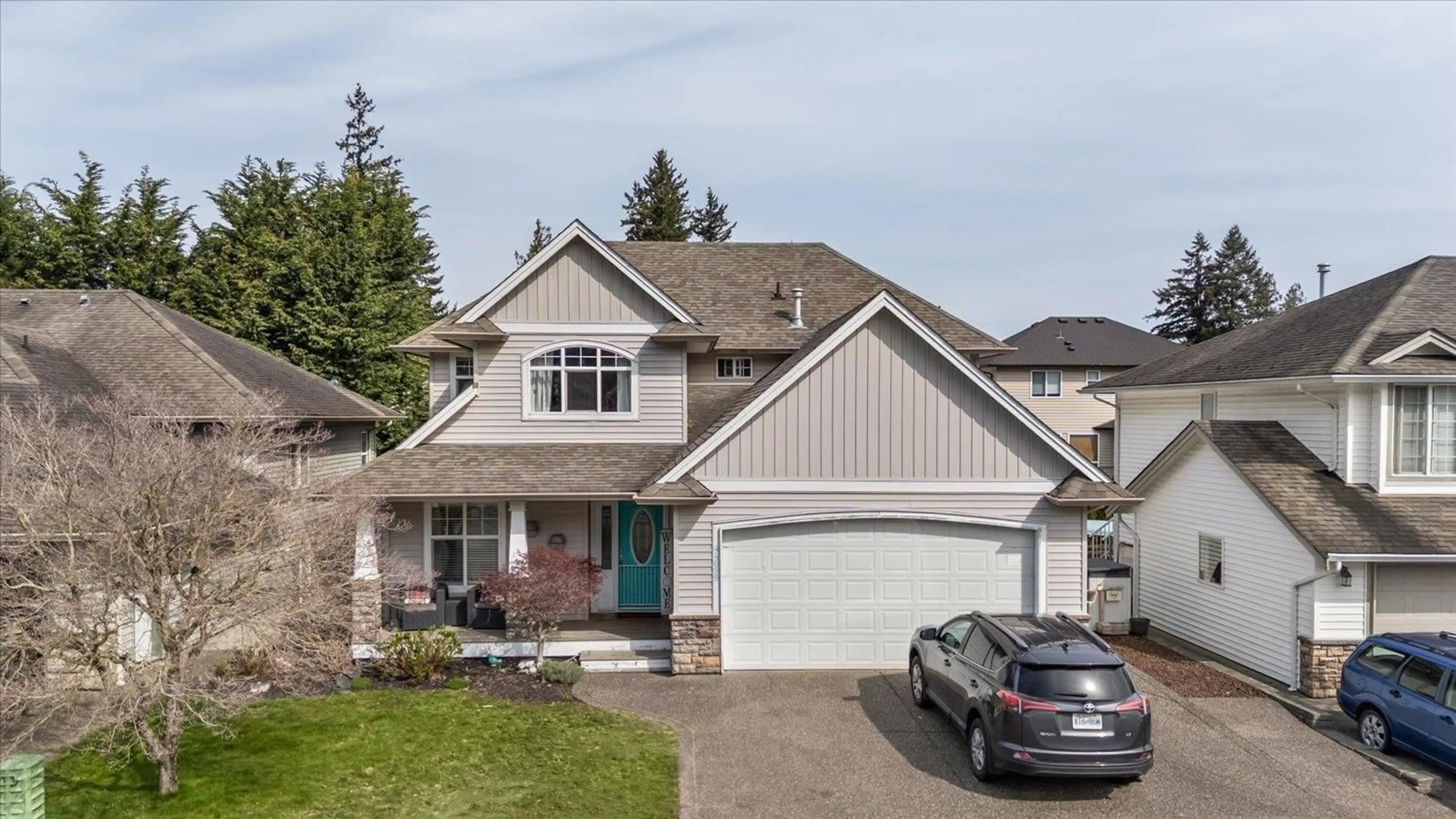 Home with vinyl exterior material, street for 44699 RIVERWOOD CRESCENT, Chilliwack British Columbia V2R5S9