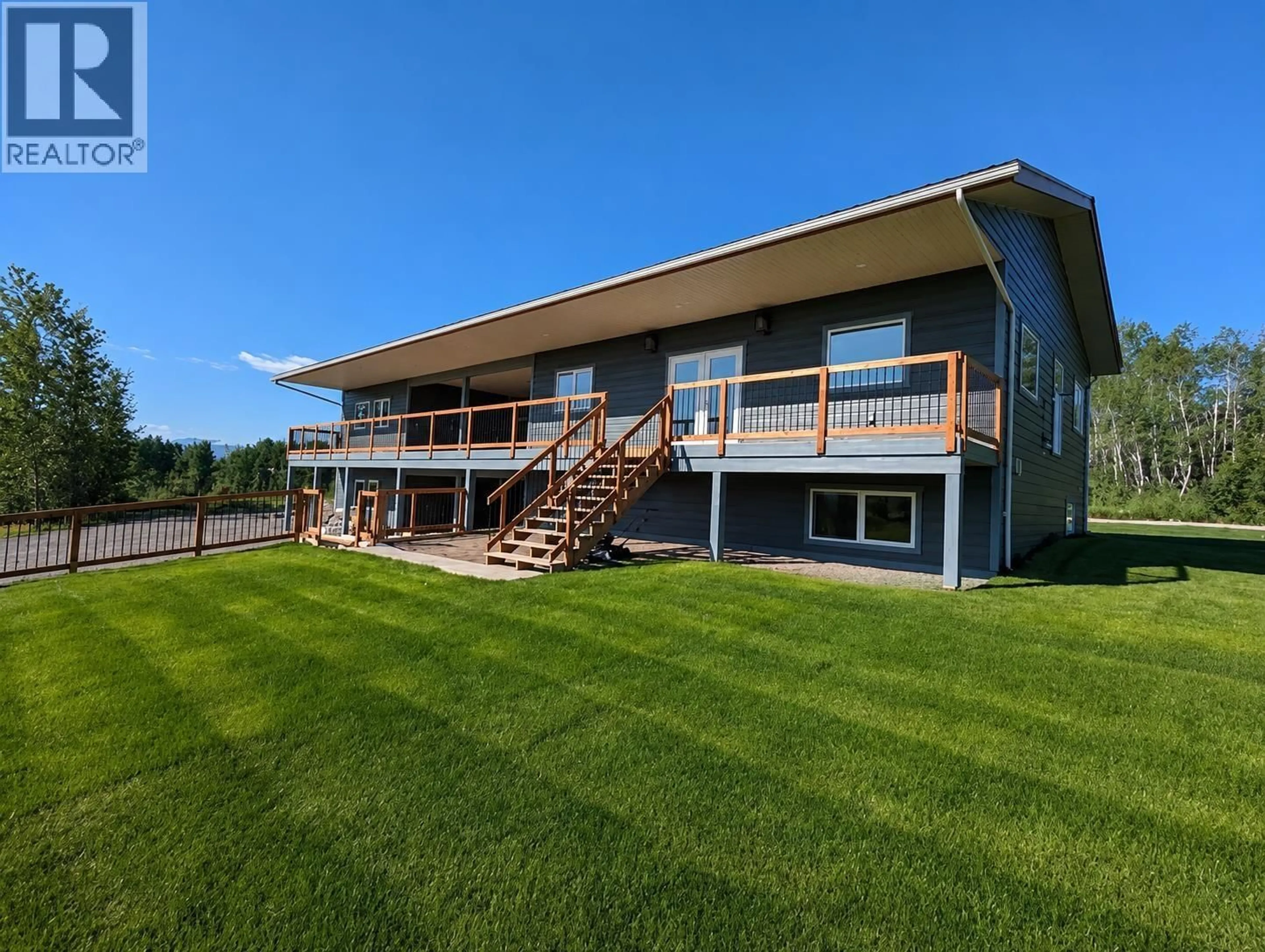A pic from outside/outdoor area/front of a property/back of a property/a pic from drone, water/lake/river/ocean view for 2530 FORD ROAD, Smithers British Columbia V0J2N4