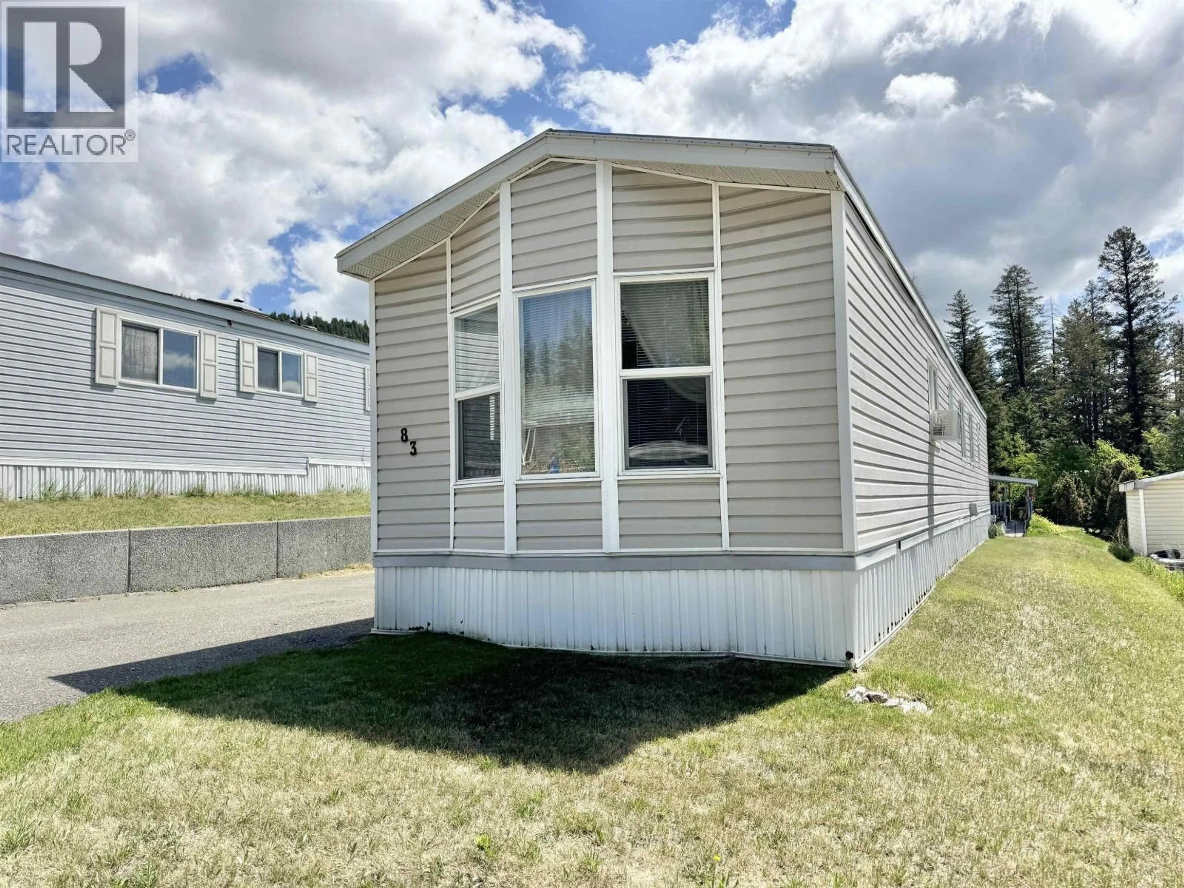 Home with vinyl exterior material, street for 83 - 770 ELEVENTH AVENUE, Williams Lake British Columbia V2G2M4