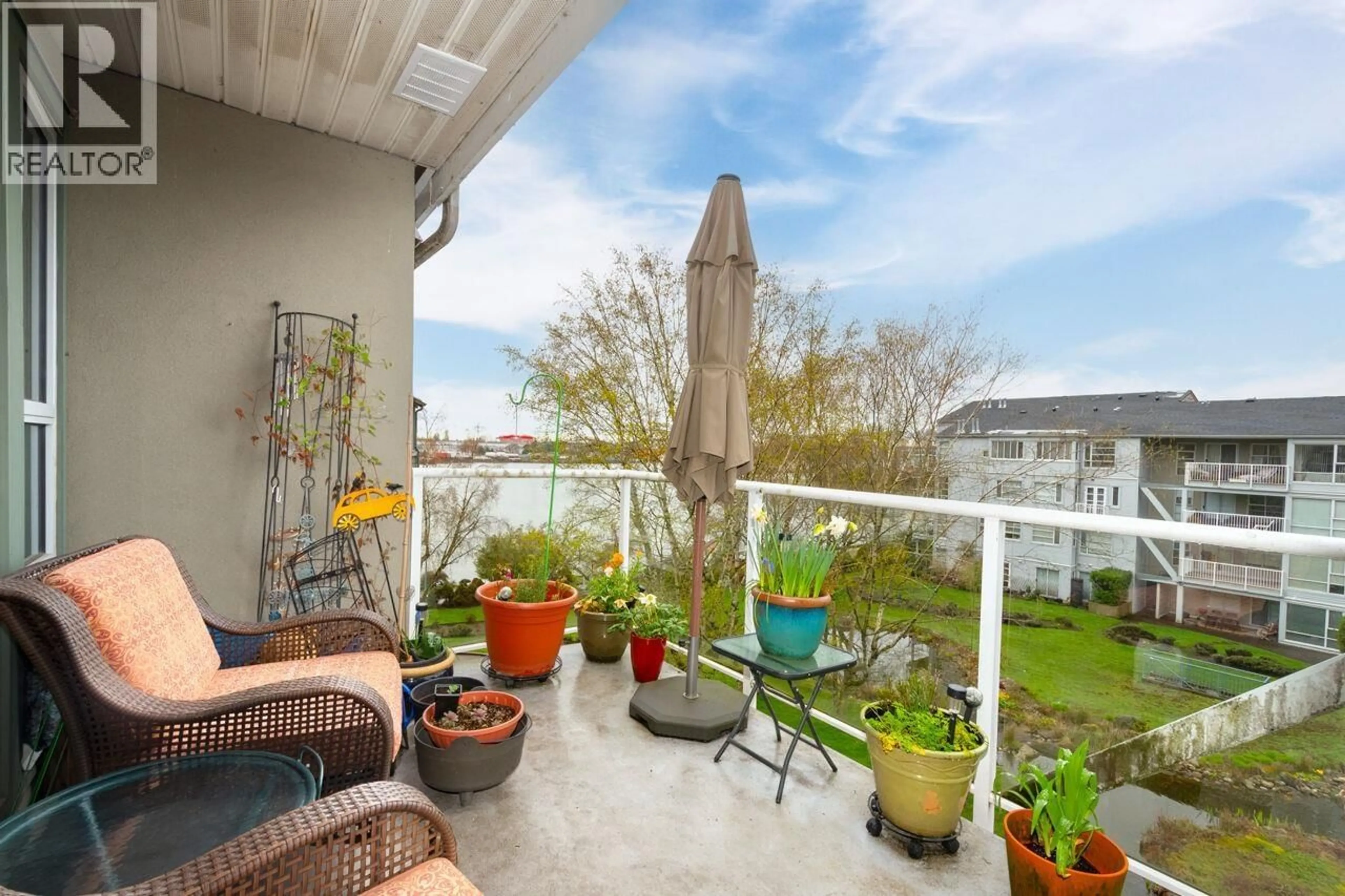 Patio, water/lake/river/ocean view for 402 - 2080 KENT AVENUE SOUTH, Vancouver British Columbia V5P4X2