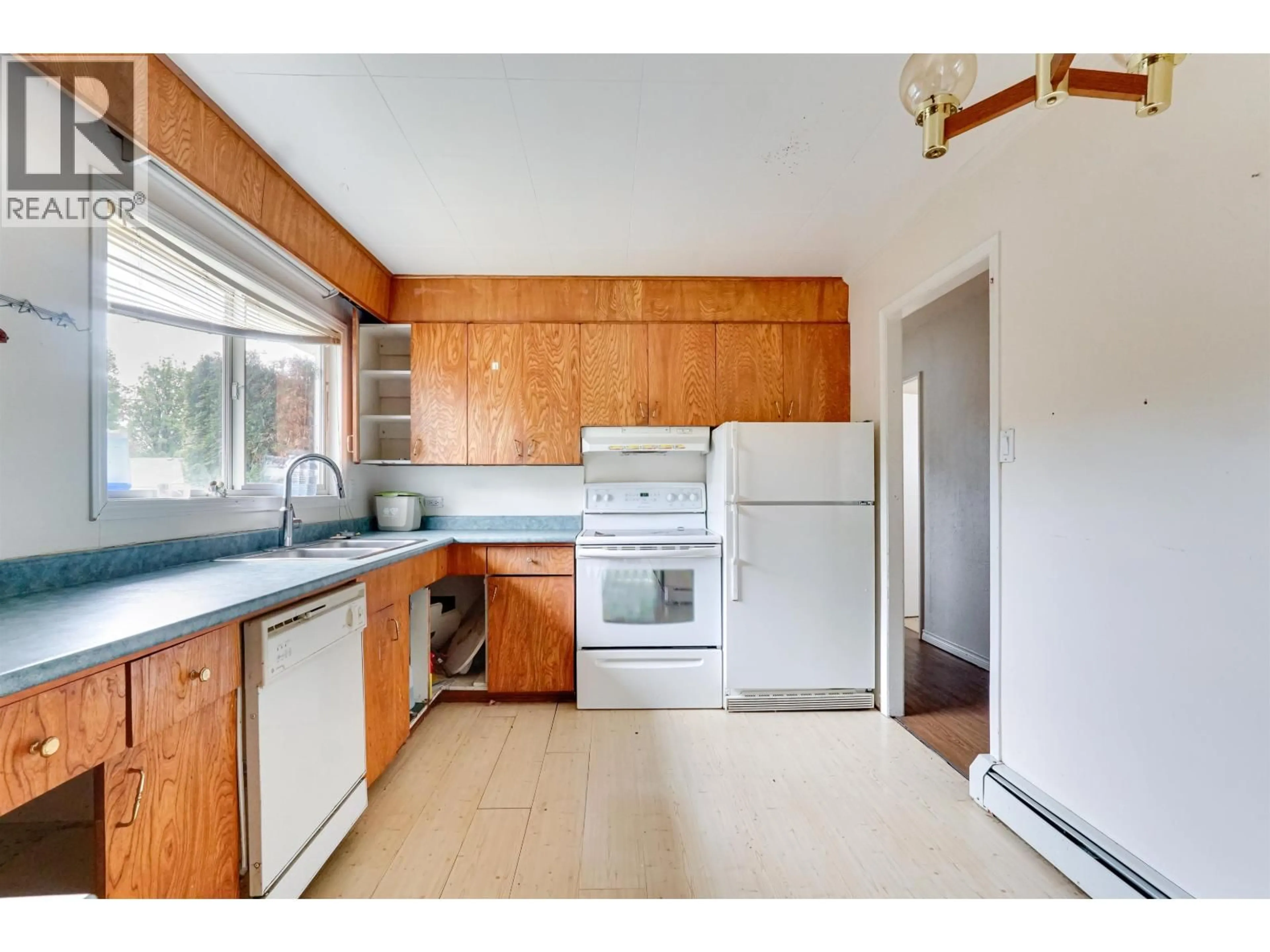 Standard kitchen, wood/laminate floor for 120 SAGUENAY STREET, Kitimat British Columbia V8C1W8