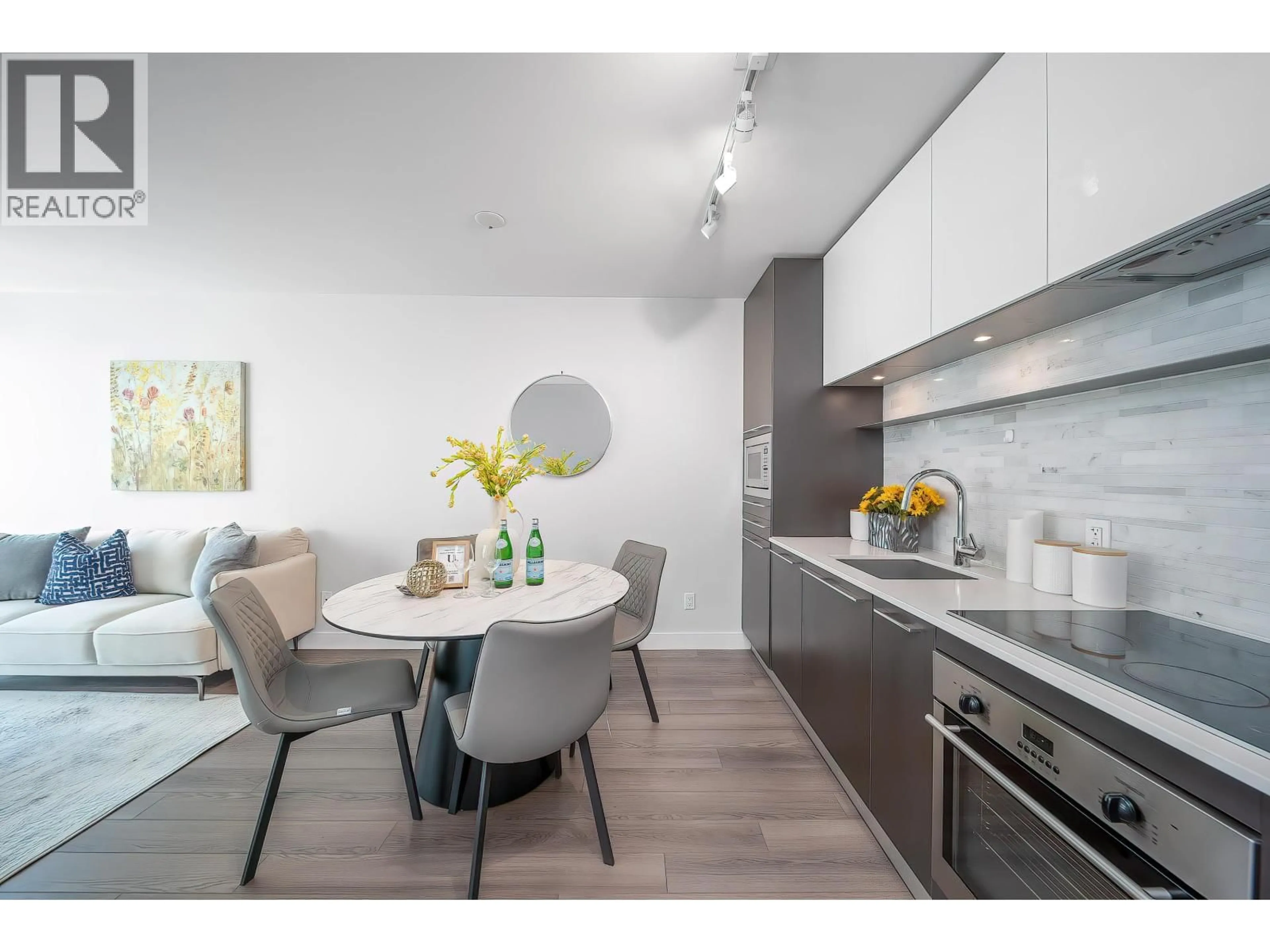 Open concept kitchen, unknown for 203 - 8031 NUNAVUT LANE, Vancouver British Columbia V5X0C9