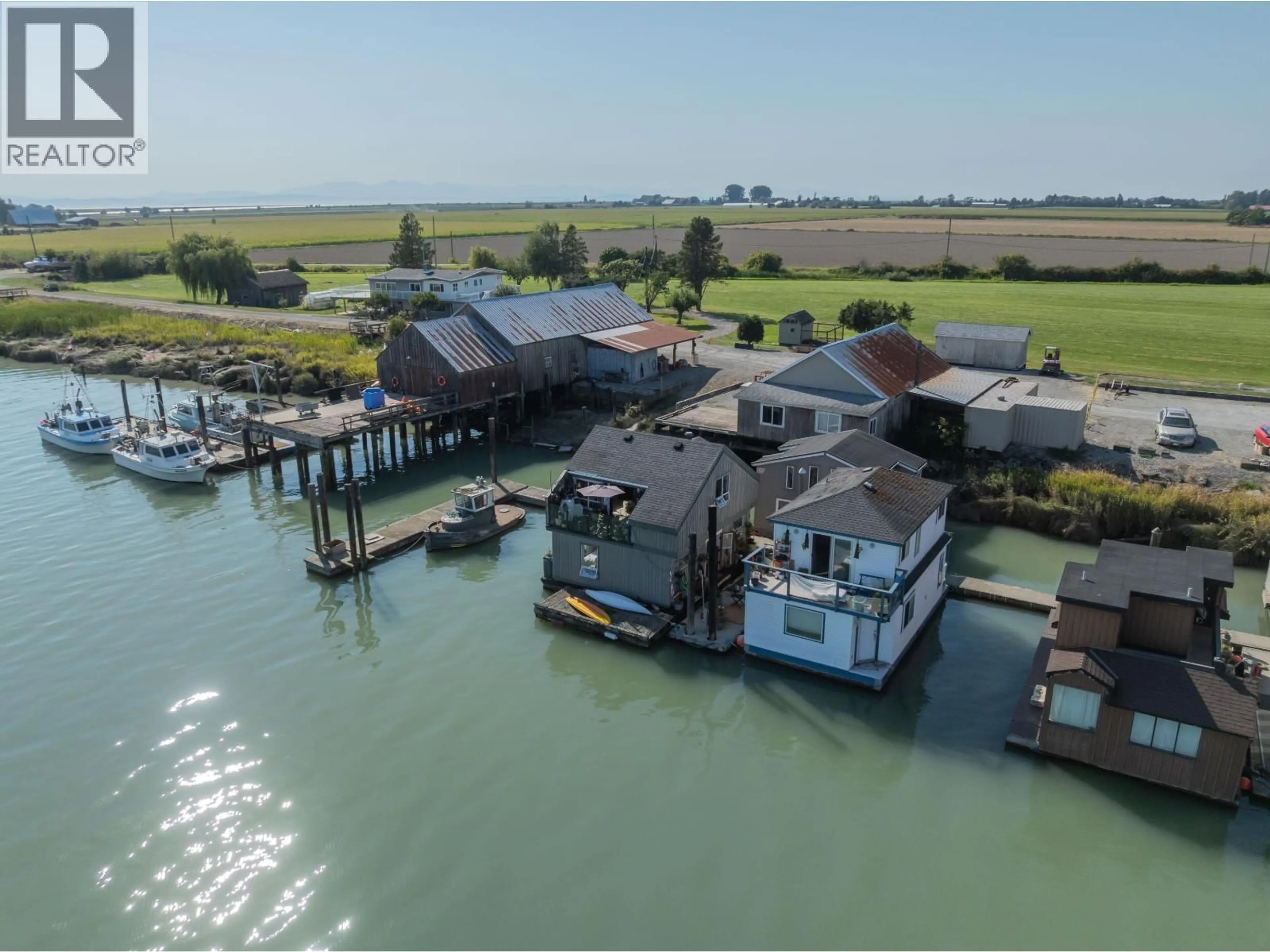 A pic from outside/outdoor area/front of a property/back of a property/a pic from drone, water/lake/river/ocean view for 12 - 3550 WESTHAM ISLAND ROAD, Delta British Columbia V4K0A4