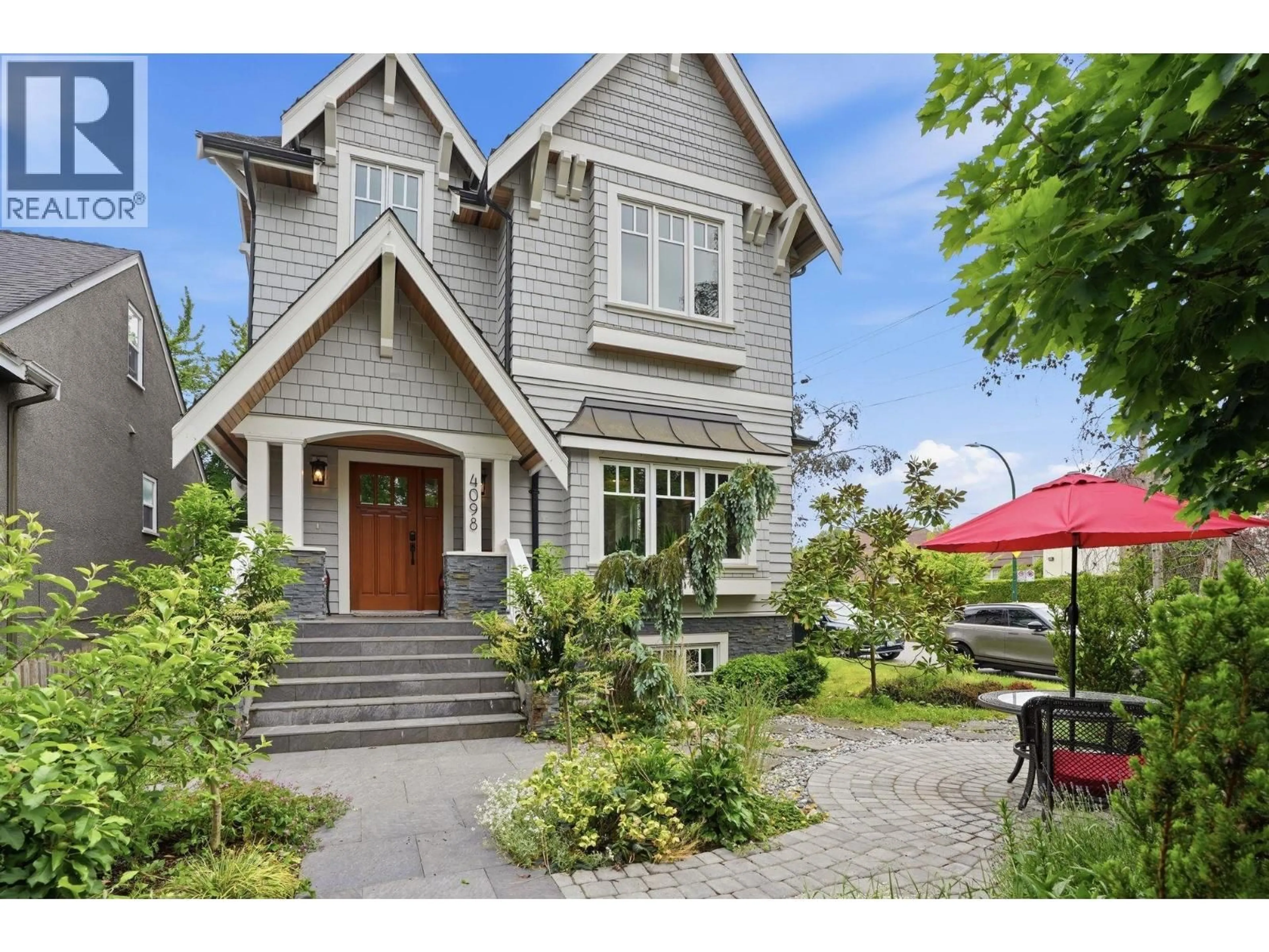 Home with brick exterior material, street for 4098 16TH AVENUE, Vancouver British Columbia V6R3E1