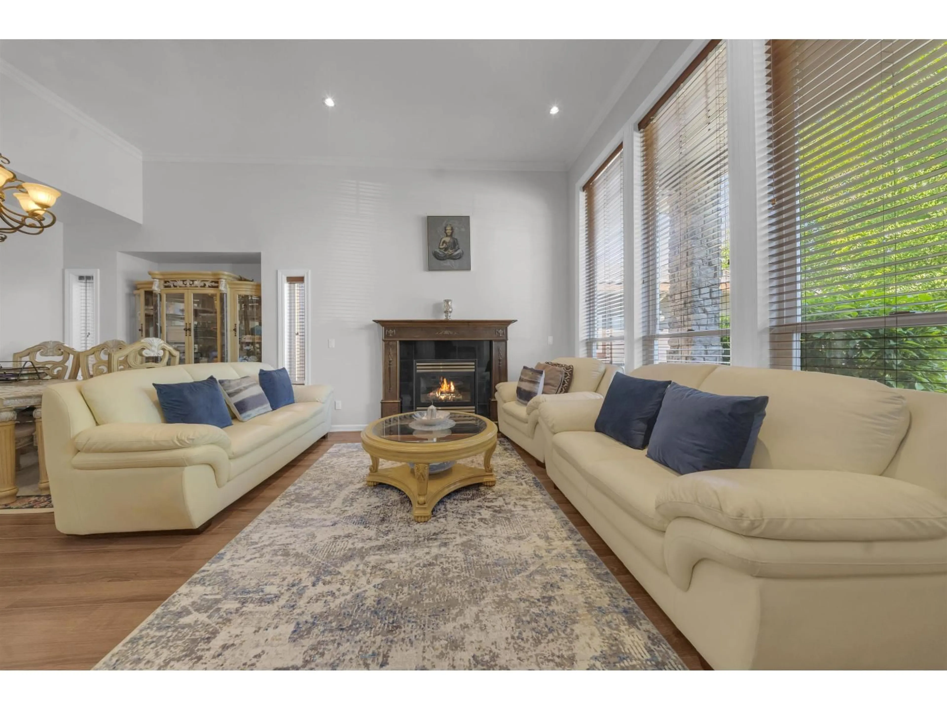 Living room with furniture, wood/laminate floor for 17460 64A AVENUE, Surrey British Columbia V3S3K9